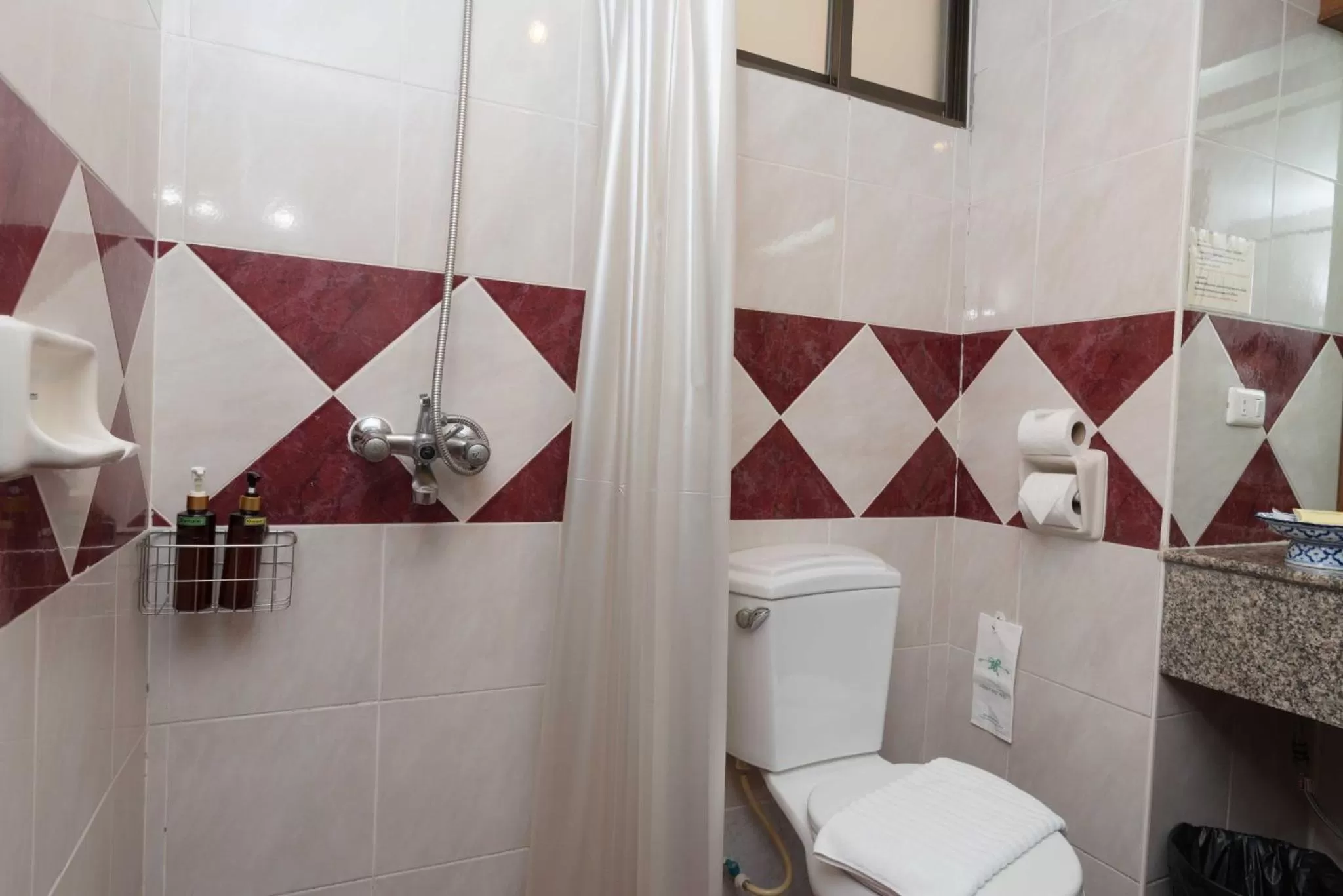 Shower in The Residence Garden