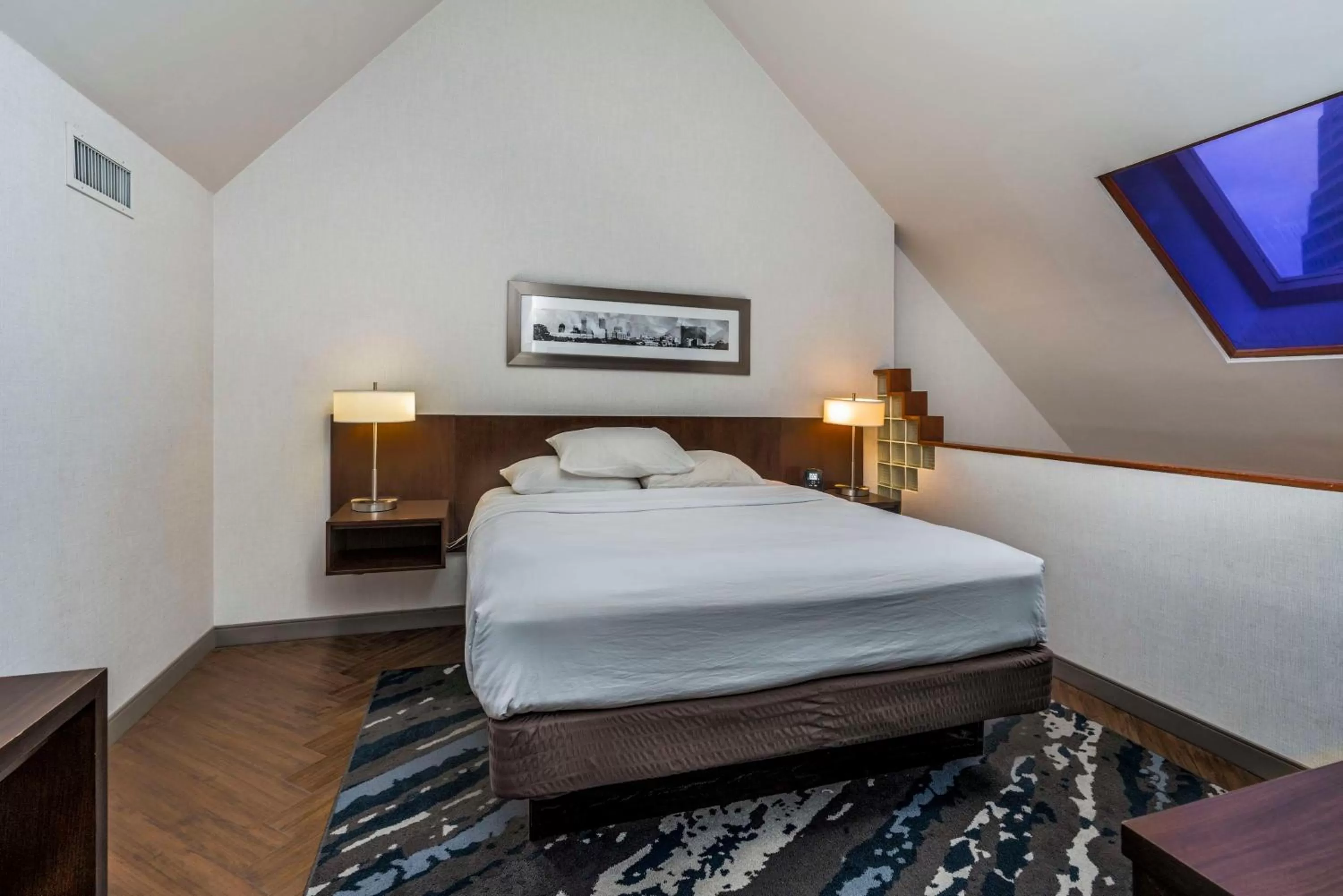 Bed in Embassy Suites by Hilton Indianapolis Downtown