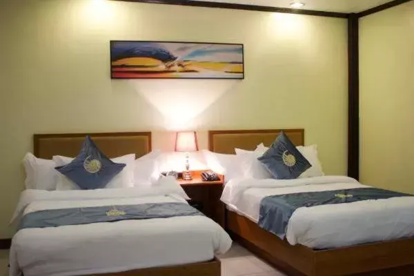 Photo of the whole room, Bed in Costa Palawan Resort