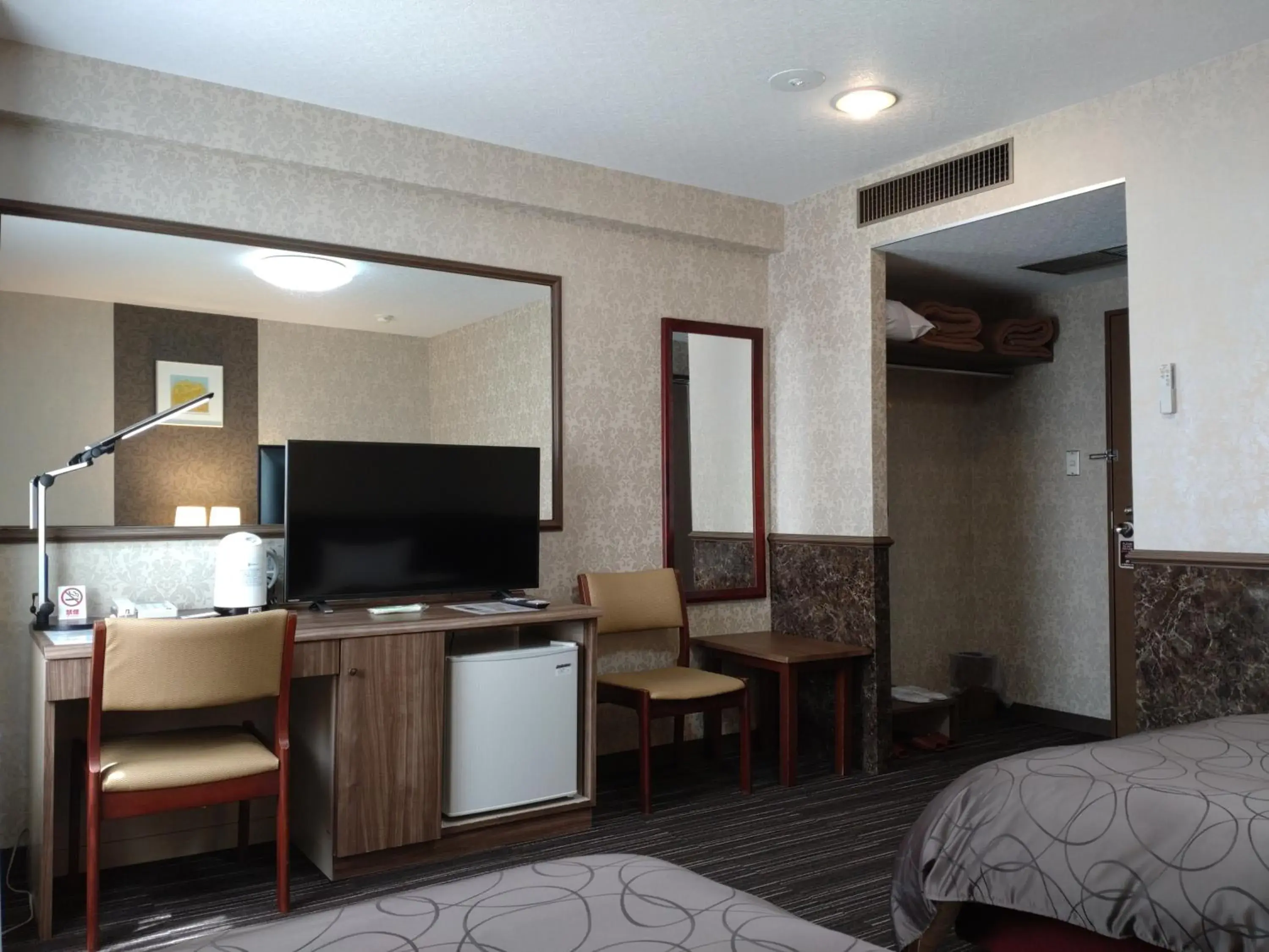 Photo of the whole room, TV/Entertainment Center in Kitami Towa Hotel