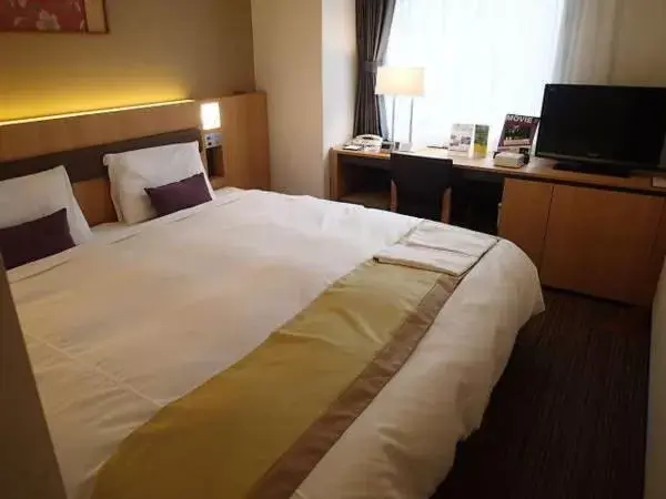 Bed in Hotel Sunroute Asakusa