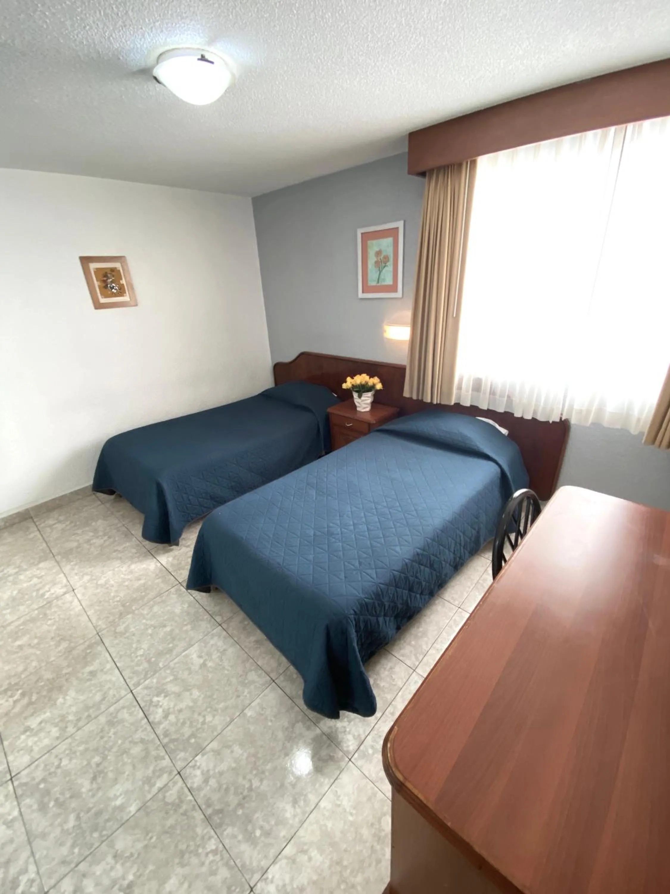 Bed in Hotel Qualitel Plus