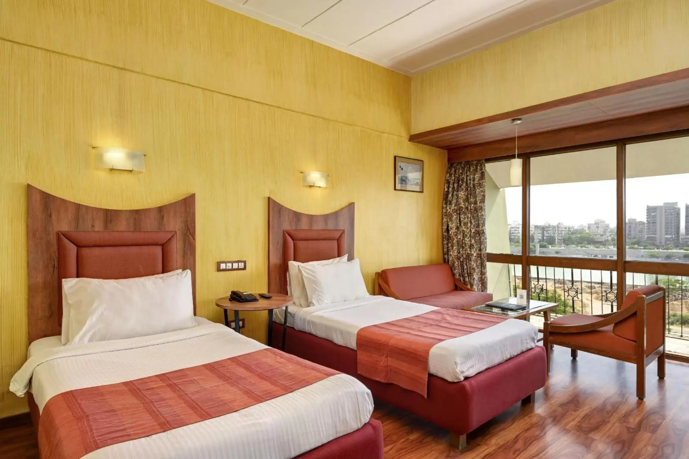 Photo of the whole room, Bed in The Cama - A Sabarmati Riverfront Hotel