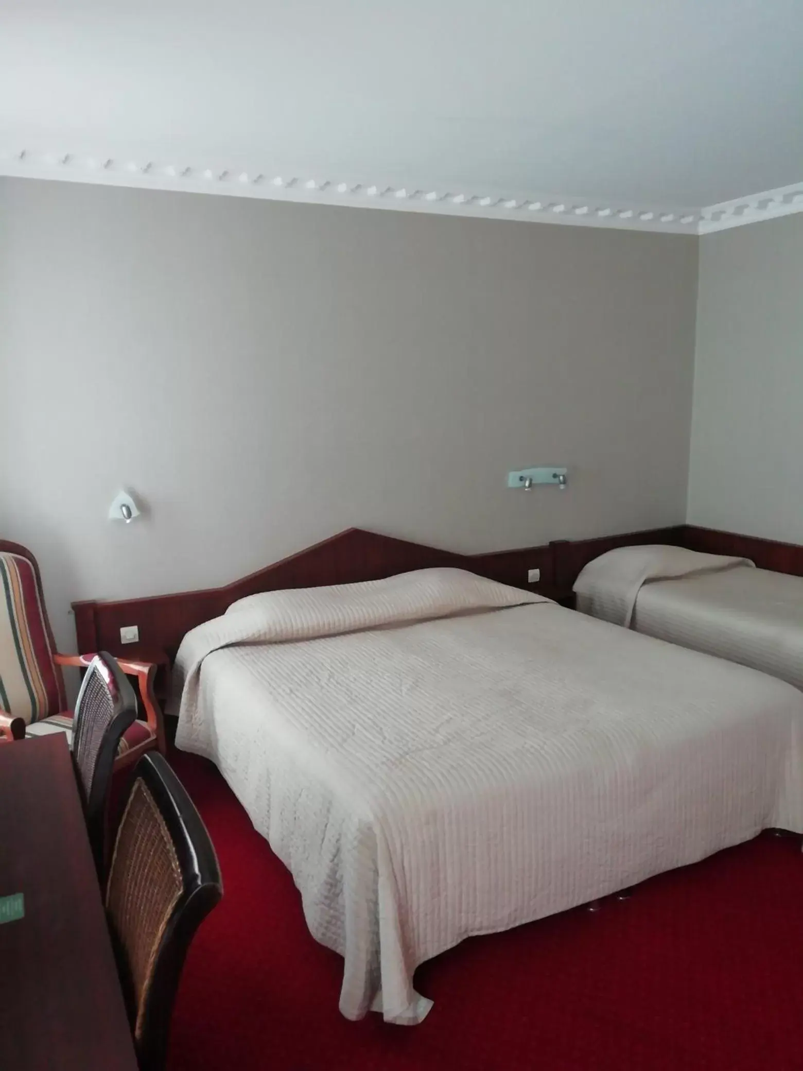 Bed in Hôtel Du Manoir Bed in Hôtel Du Manoir