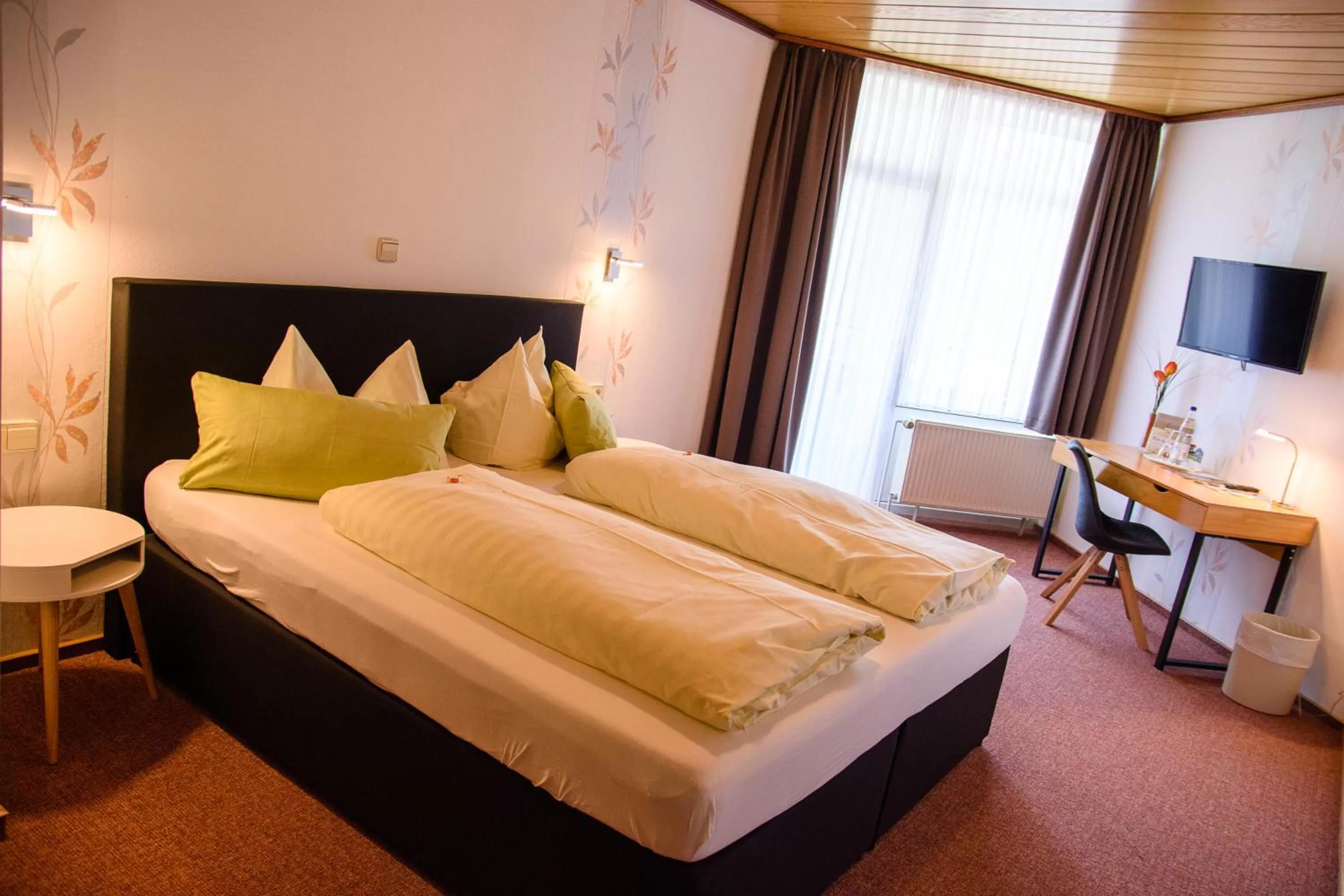 Photo of the whole room, Bed in Landhotel Henkenhof Willingen