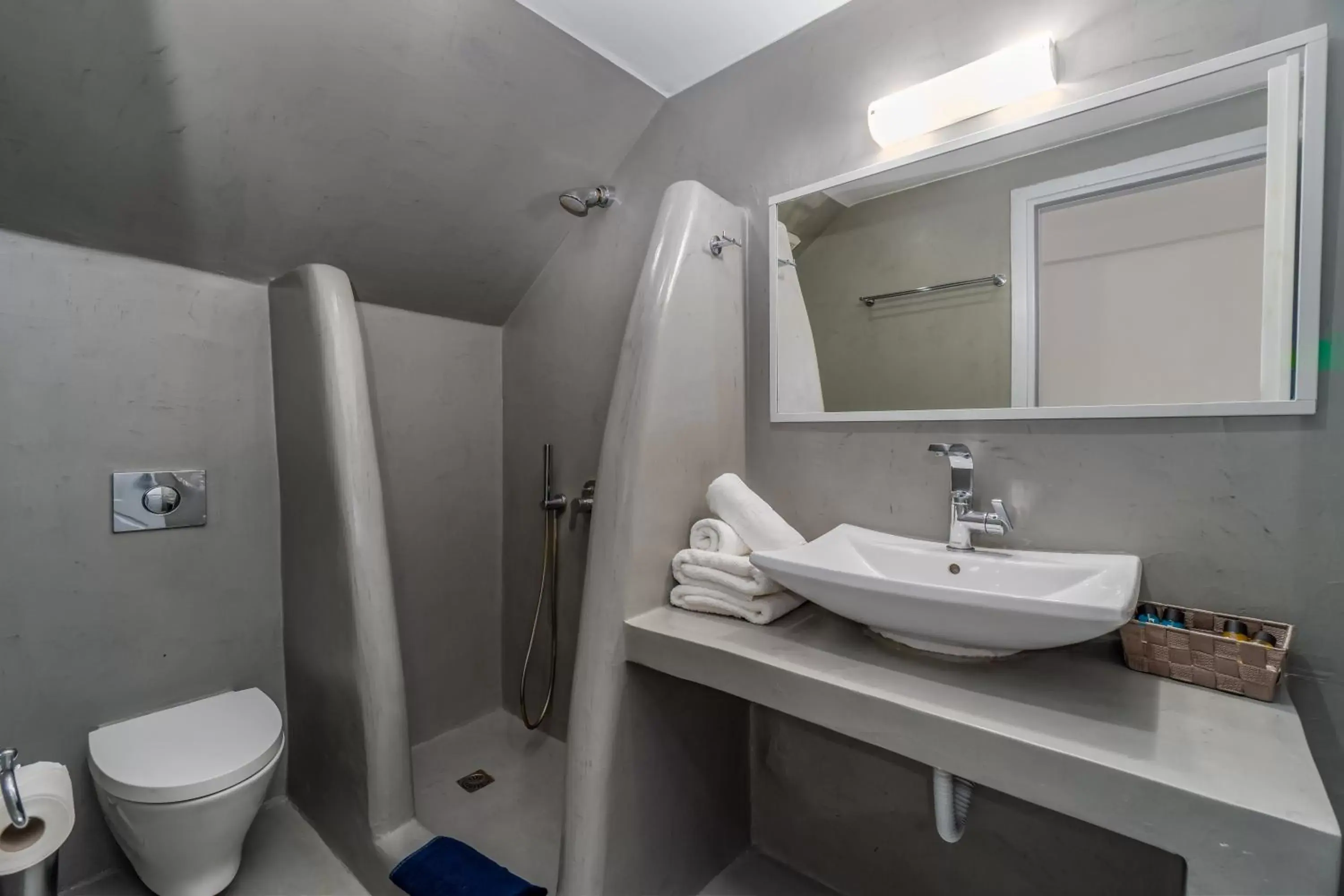 Bathroom in Central Fira Suites