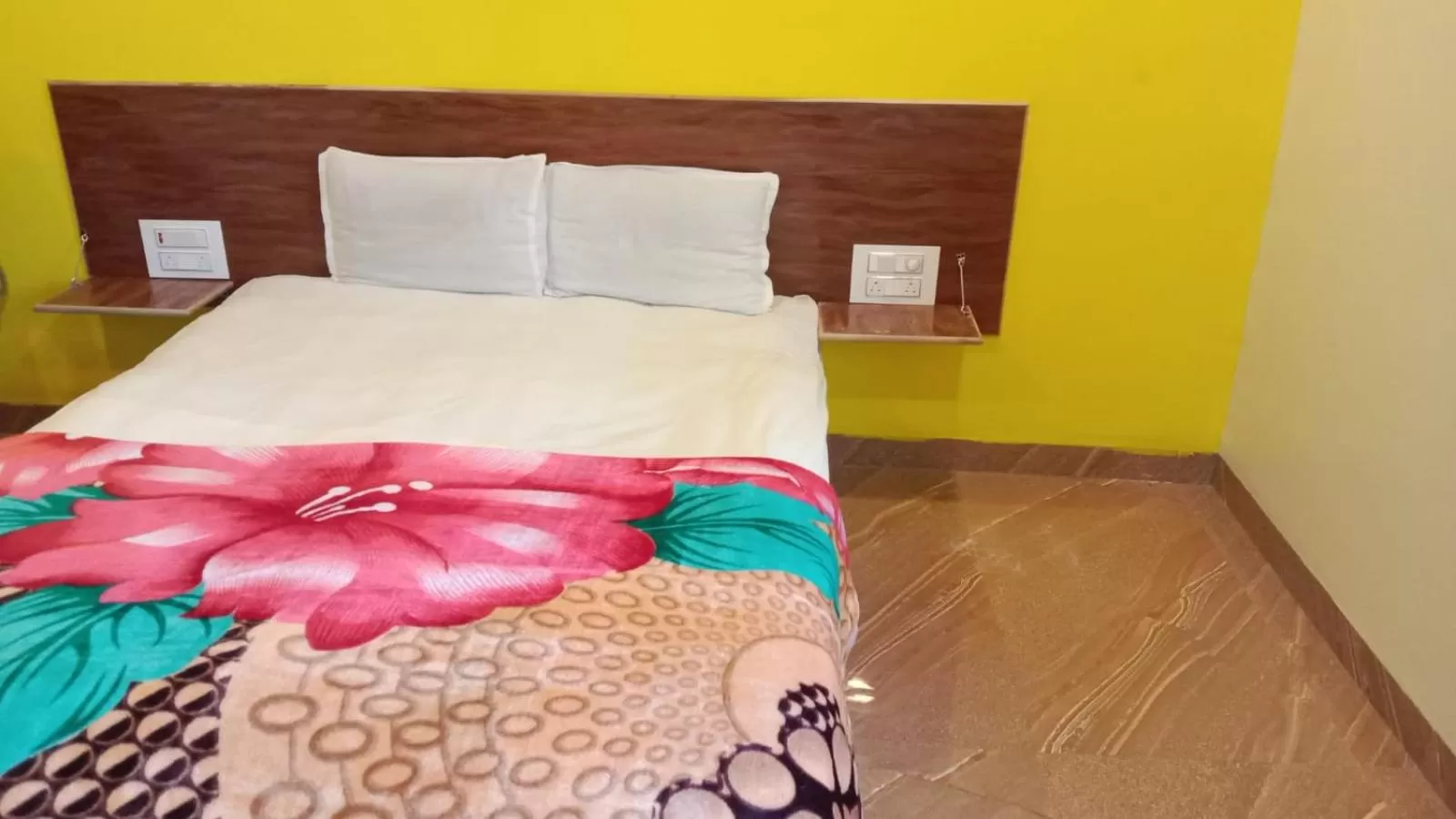 Bed in Hotel Nisarg Lodging And Restaurant