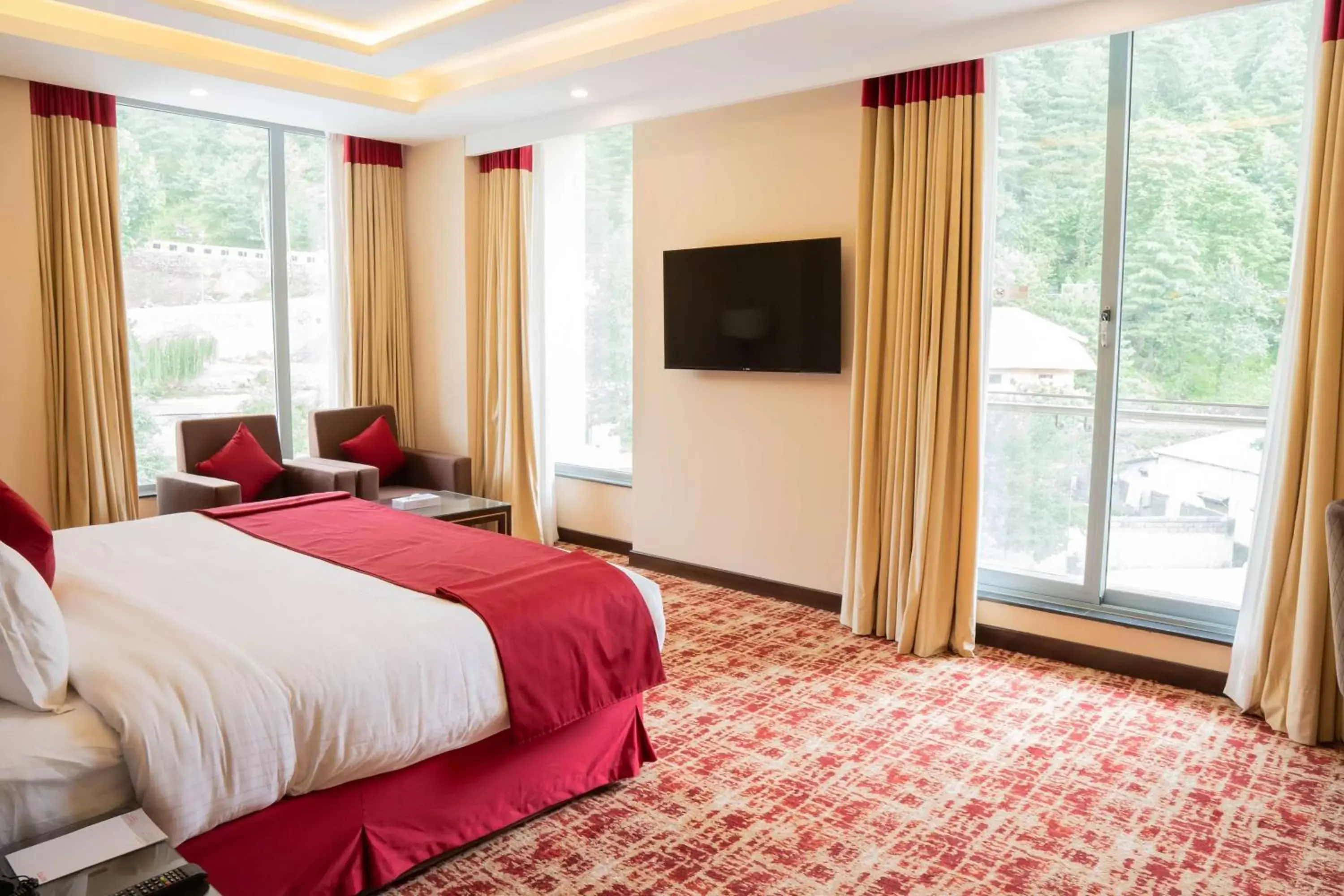 Bed in Ramada by Wyndham Murree Lower Topa Resort