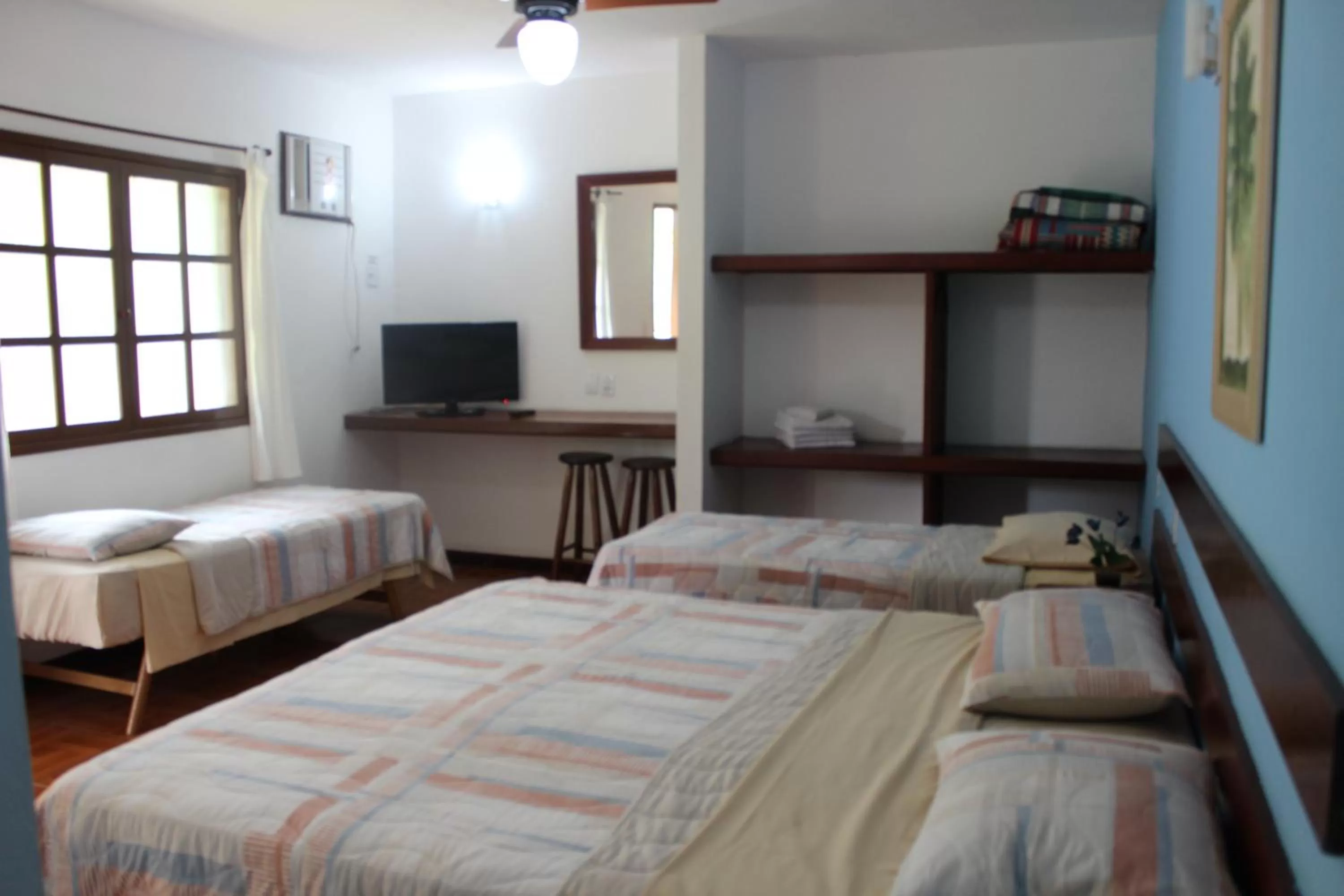 Bed in Pousada Flor de Paraty