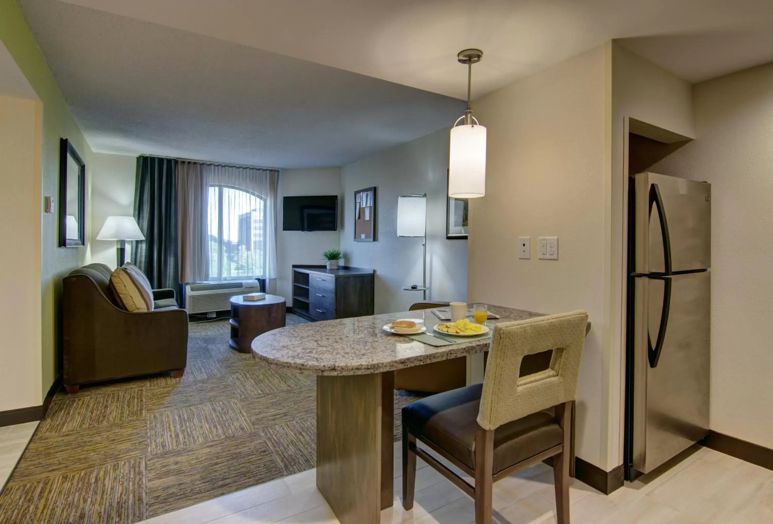 Bedroom, Seating Area in Candlewood Suites Richmond - West Broad, an IHG Hotel