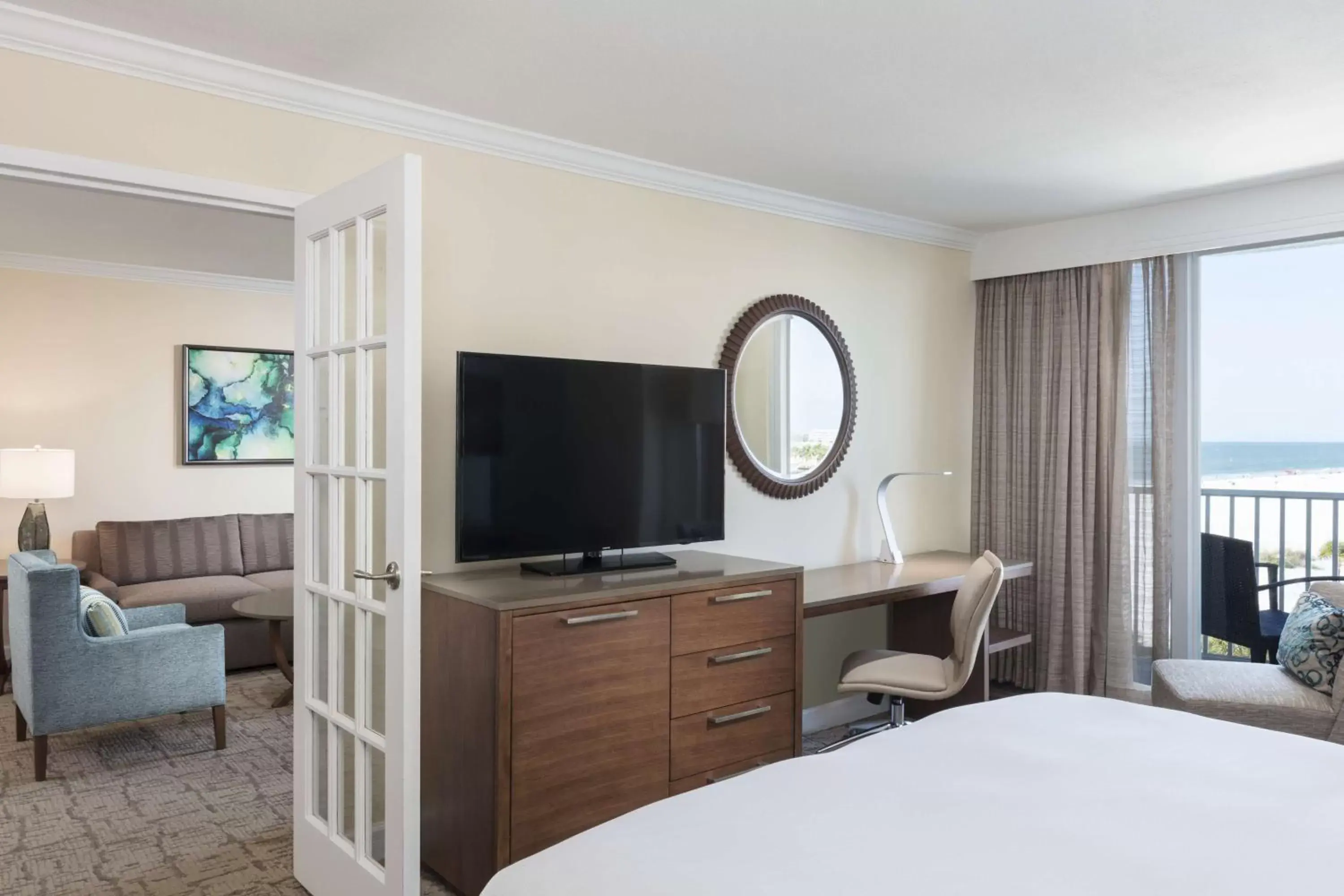 Bed, TV/Entertainment Center in Hilton Clearwater Beach Resort & Spa