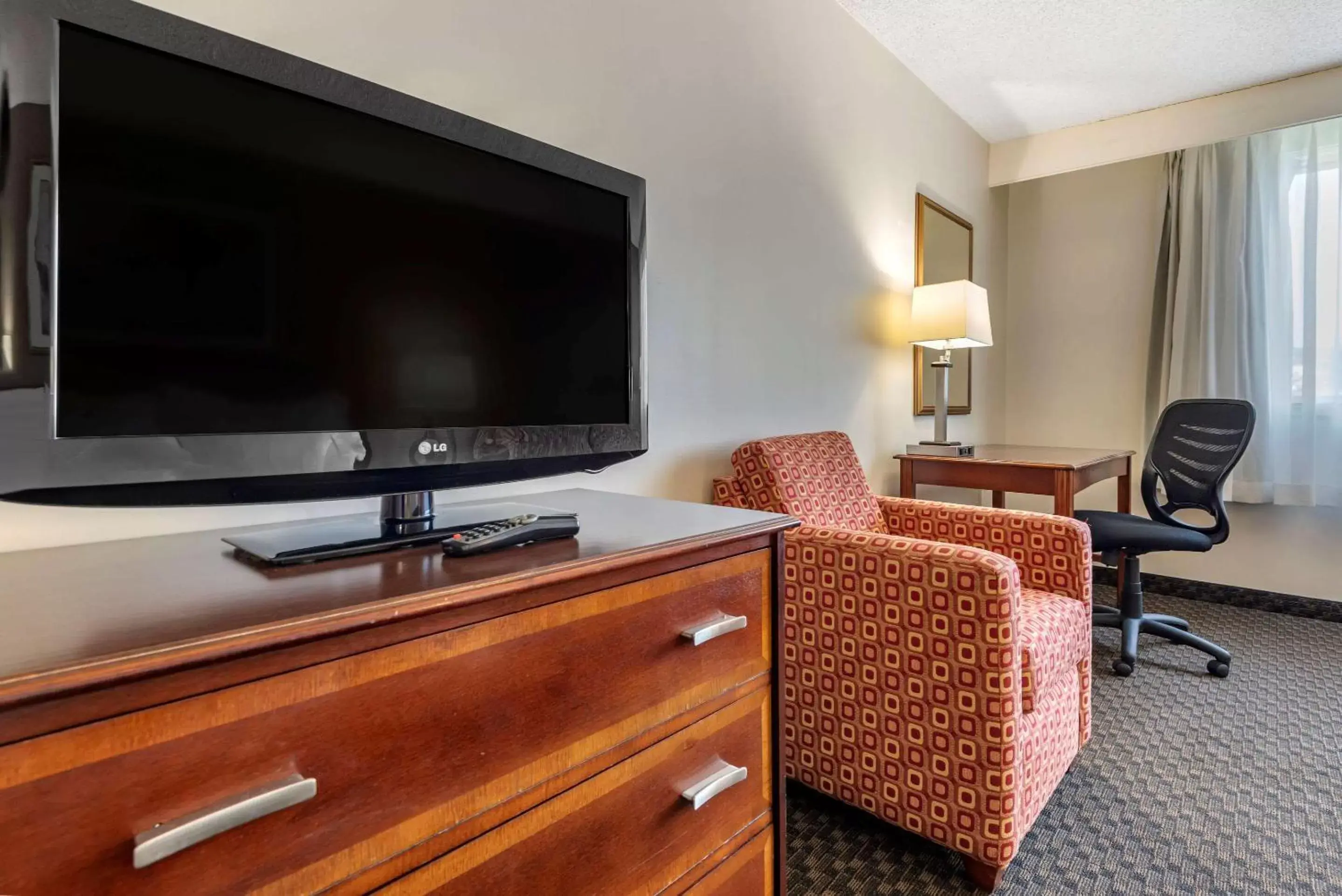 Photo of the whole room, TV/Entertainment Center in Quality Inn & Suites Vestal Binghamton near University