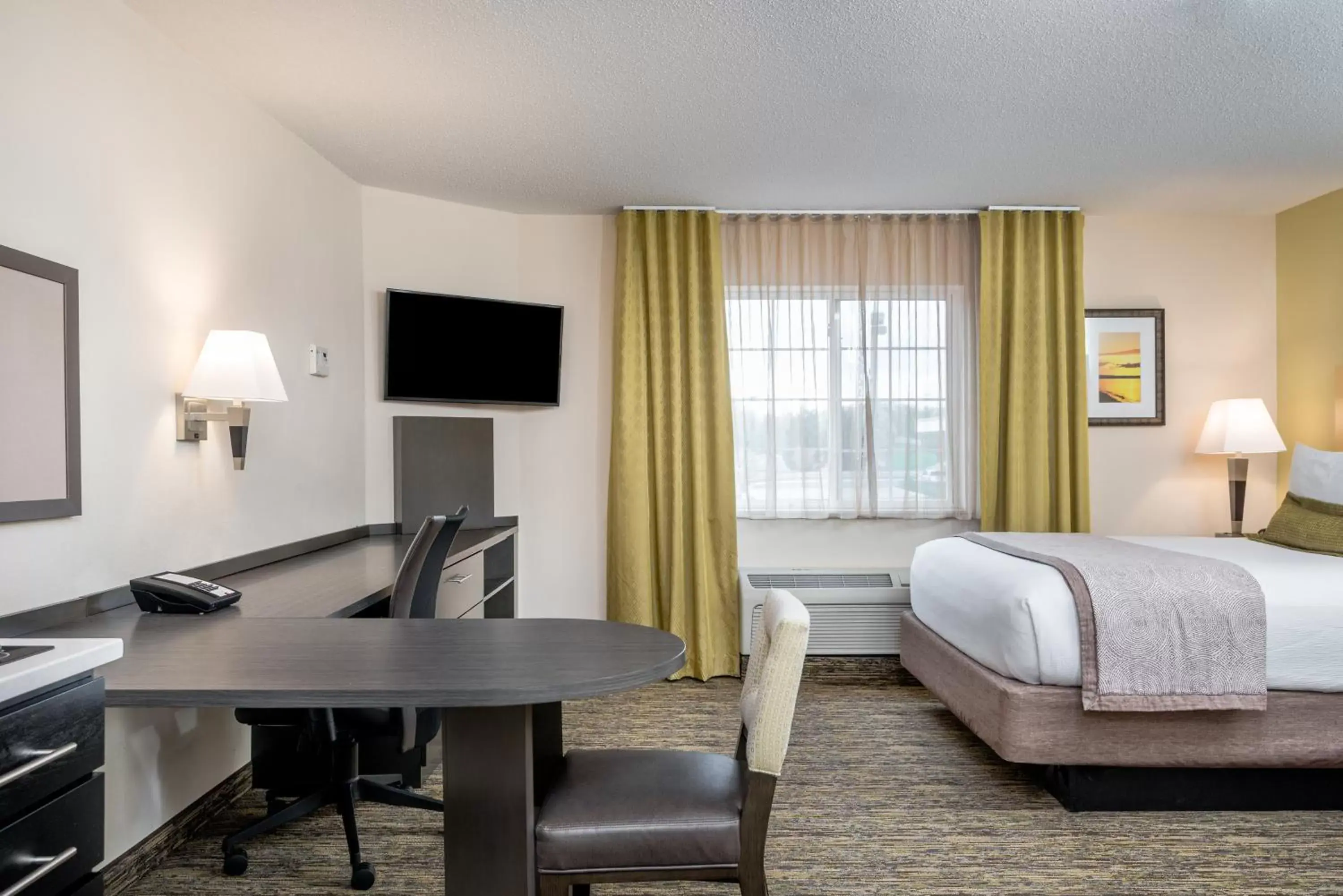 Photo of the whole room, TV/Entertainment Center in Candlewood Suites Sterling, an IHG Hotel