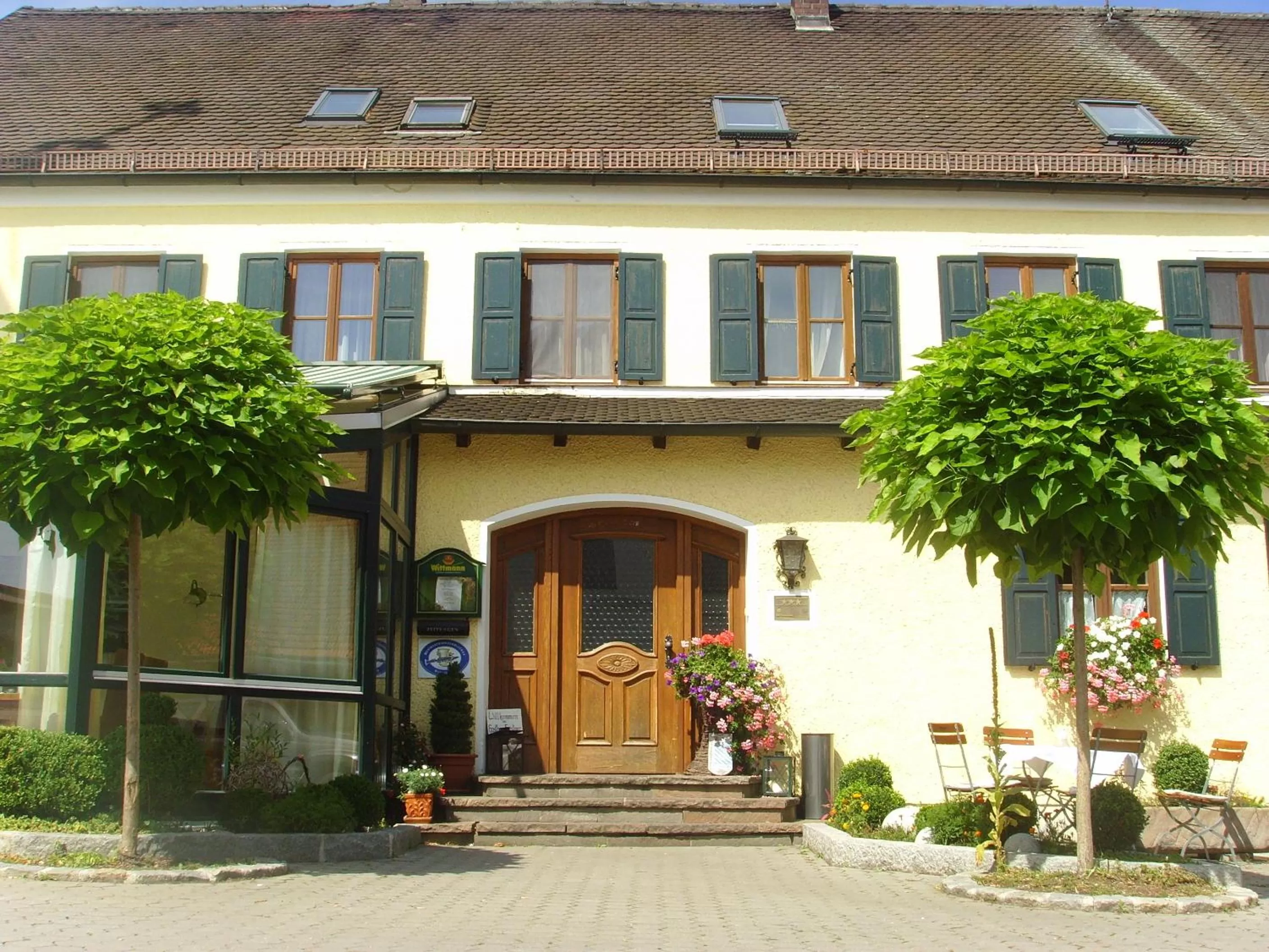 Facade/entrance in Forstnerwirt hotel | stubn | biergarten