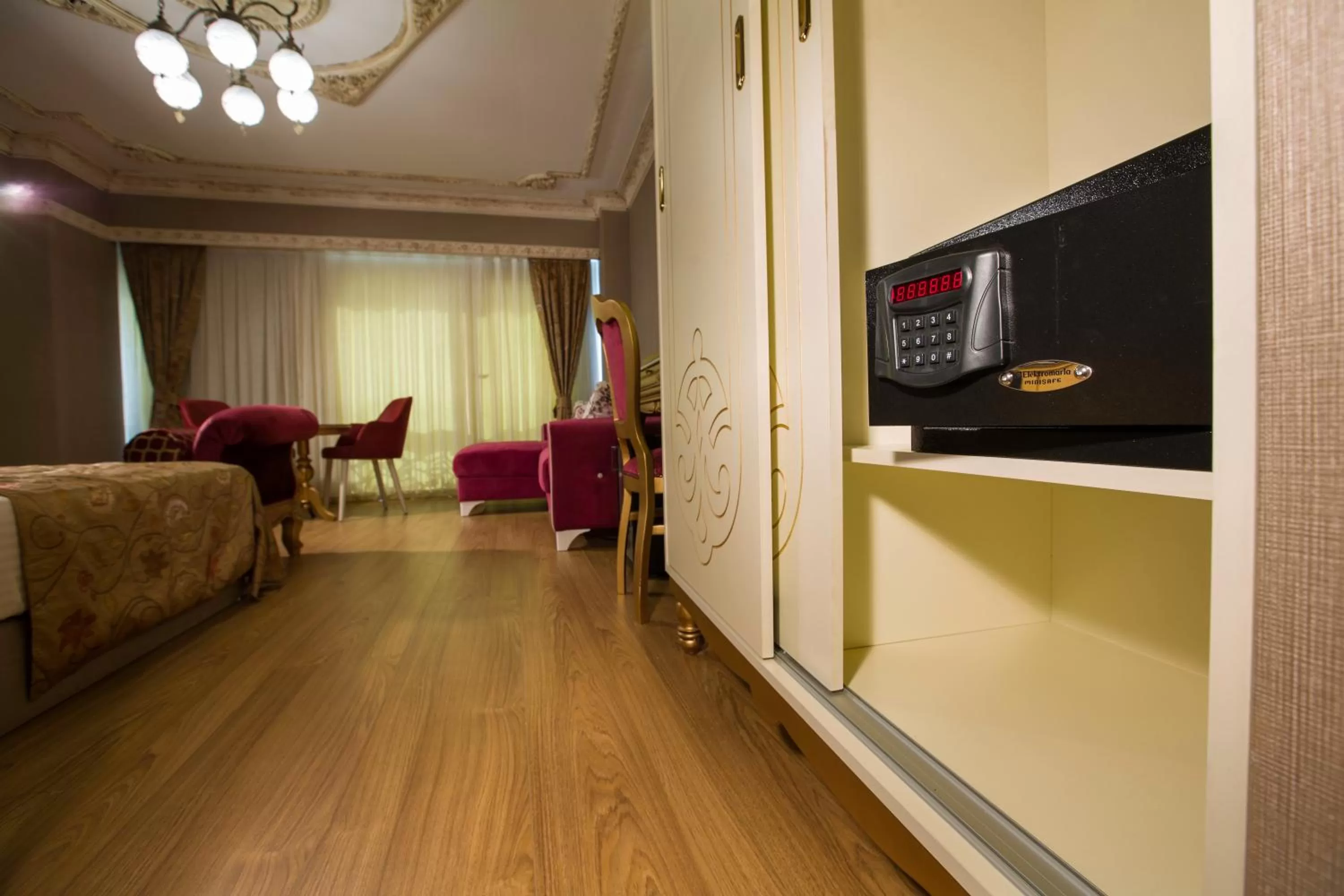 Living room in Empire Suite Hotel