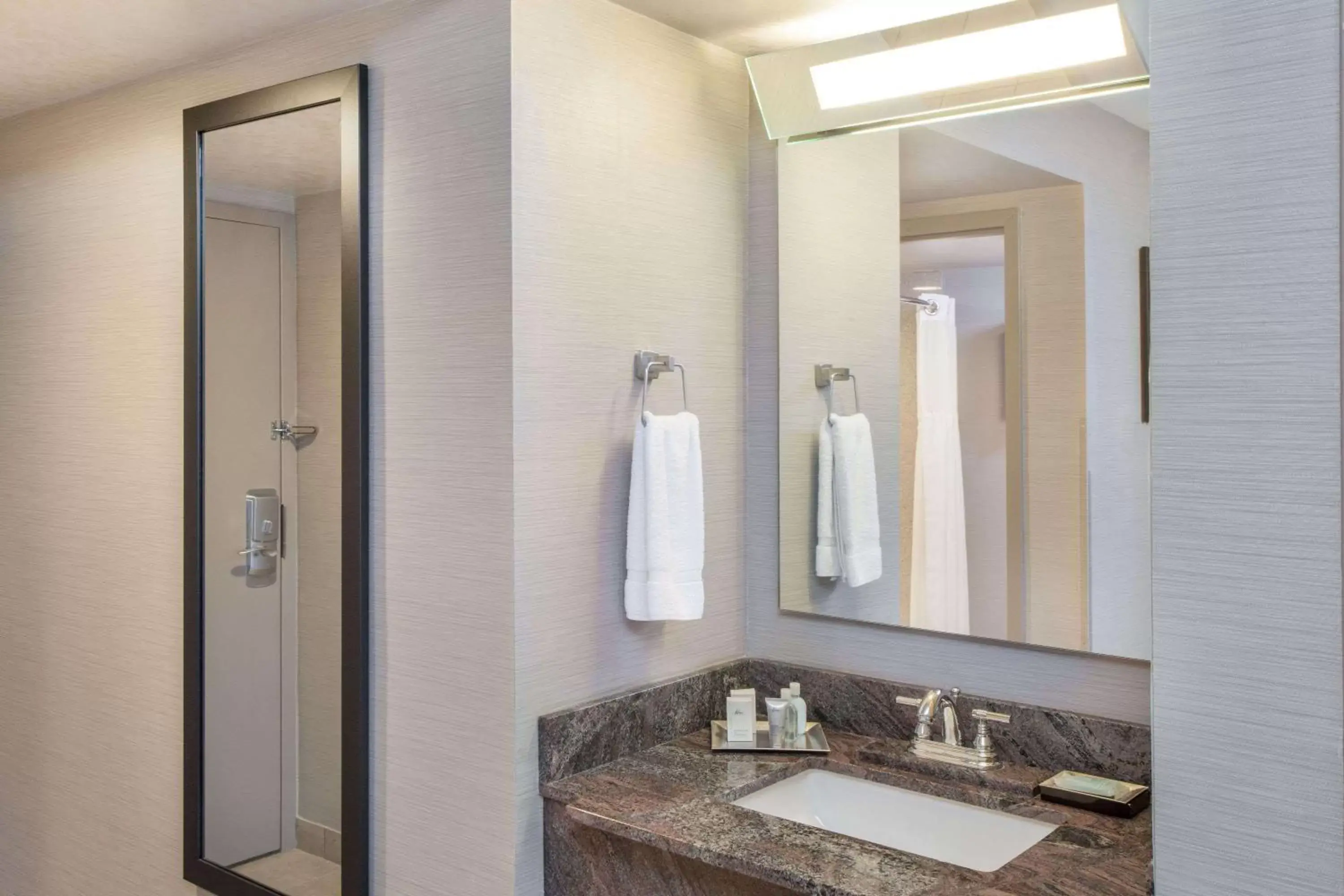 Photo of the whole room, Bathroom in Wyndham Garden Elk Grove Village - O'Hare