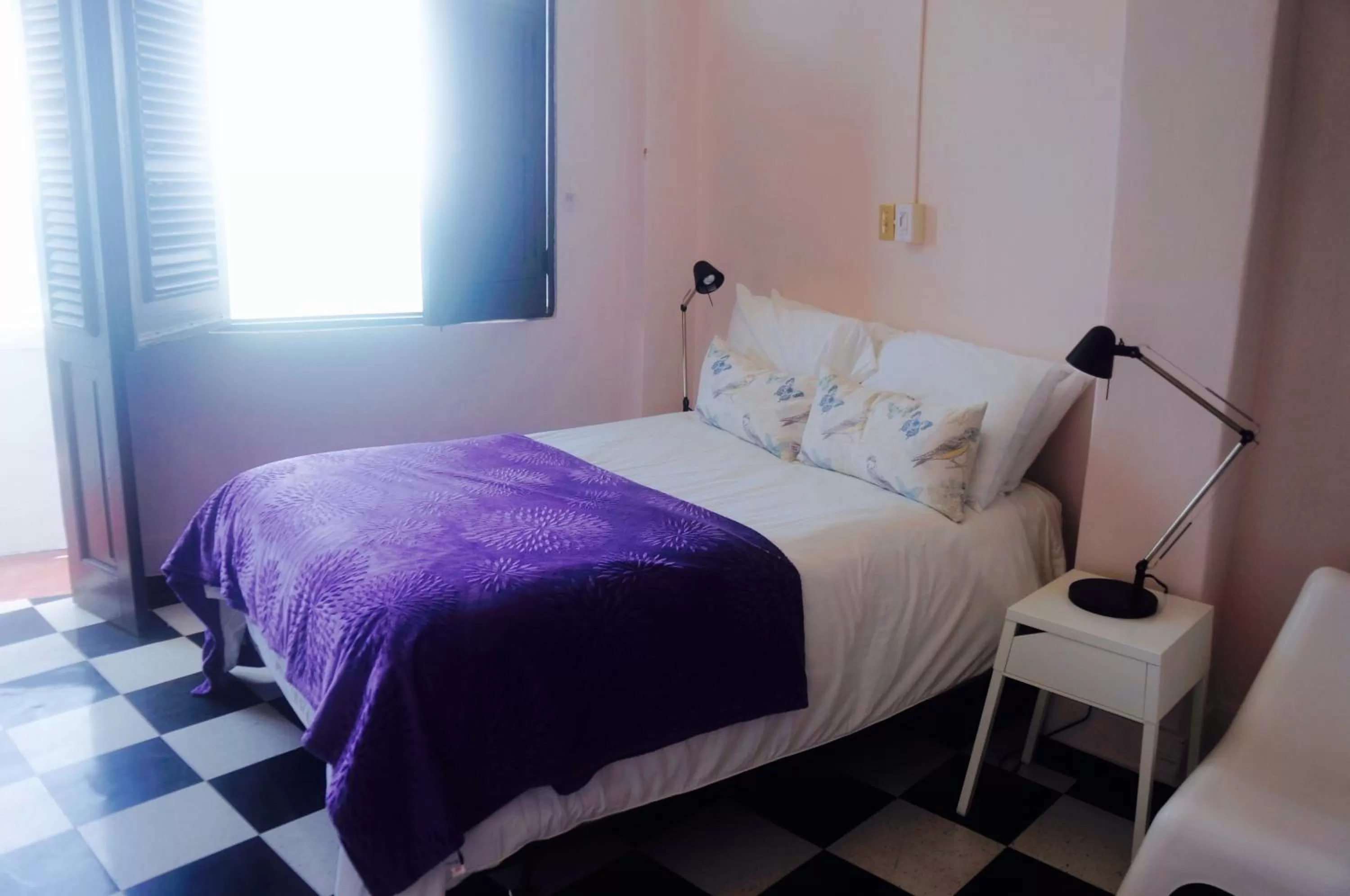 Bed in La Capitana Old San Juan Building