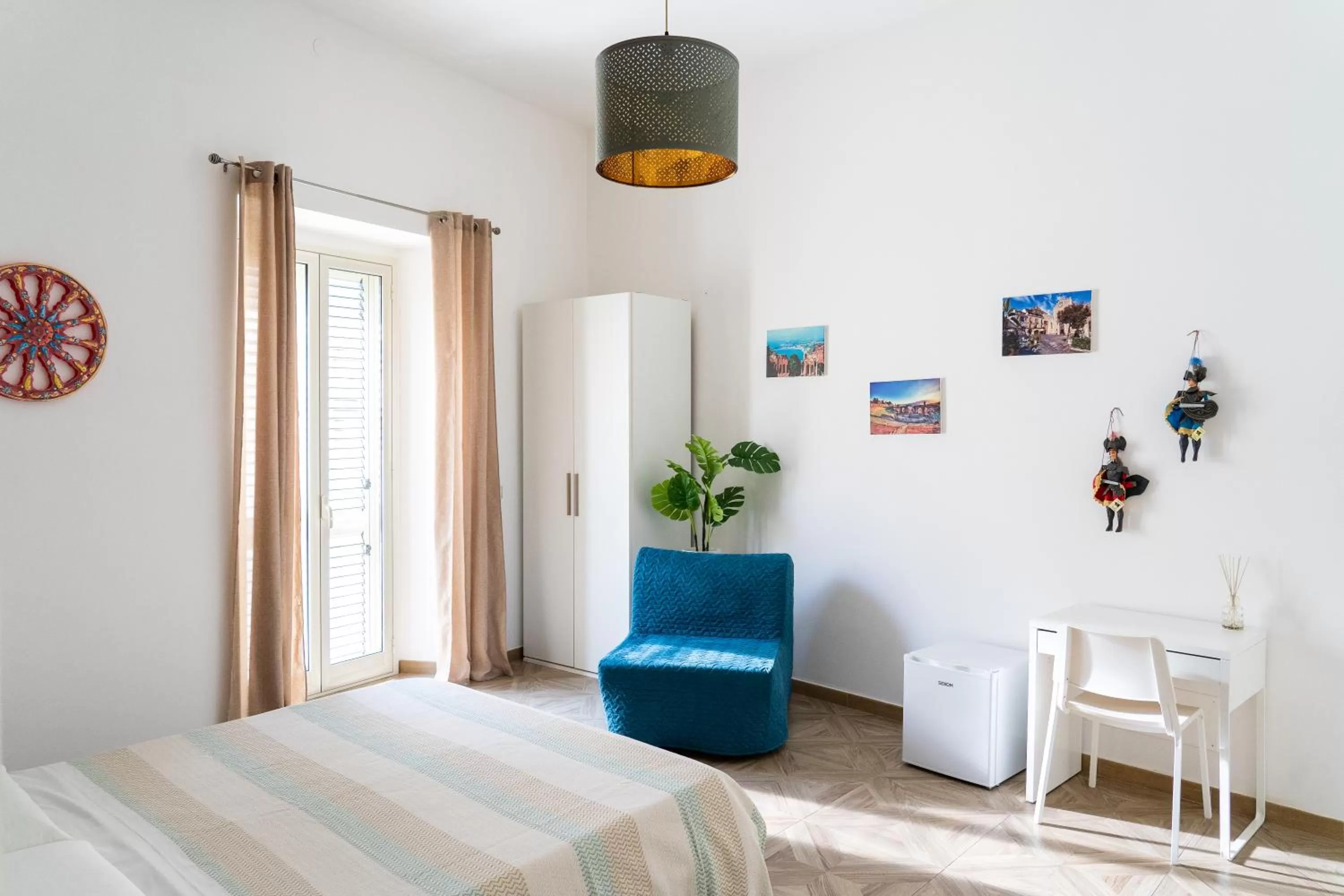 Bed in Portosalvo Rooms