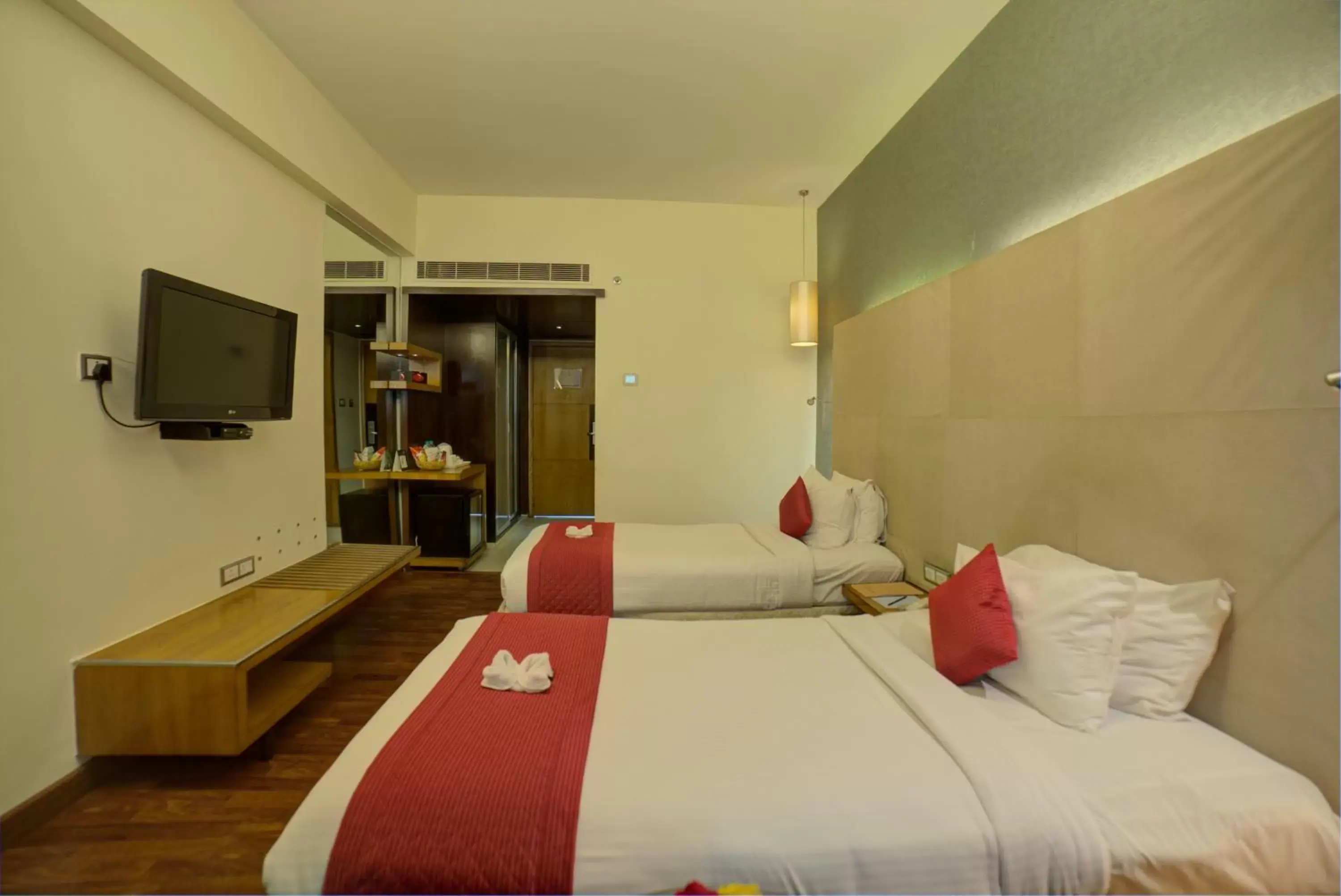 Bed in Goldfinch Hotel Mangalore