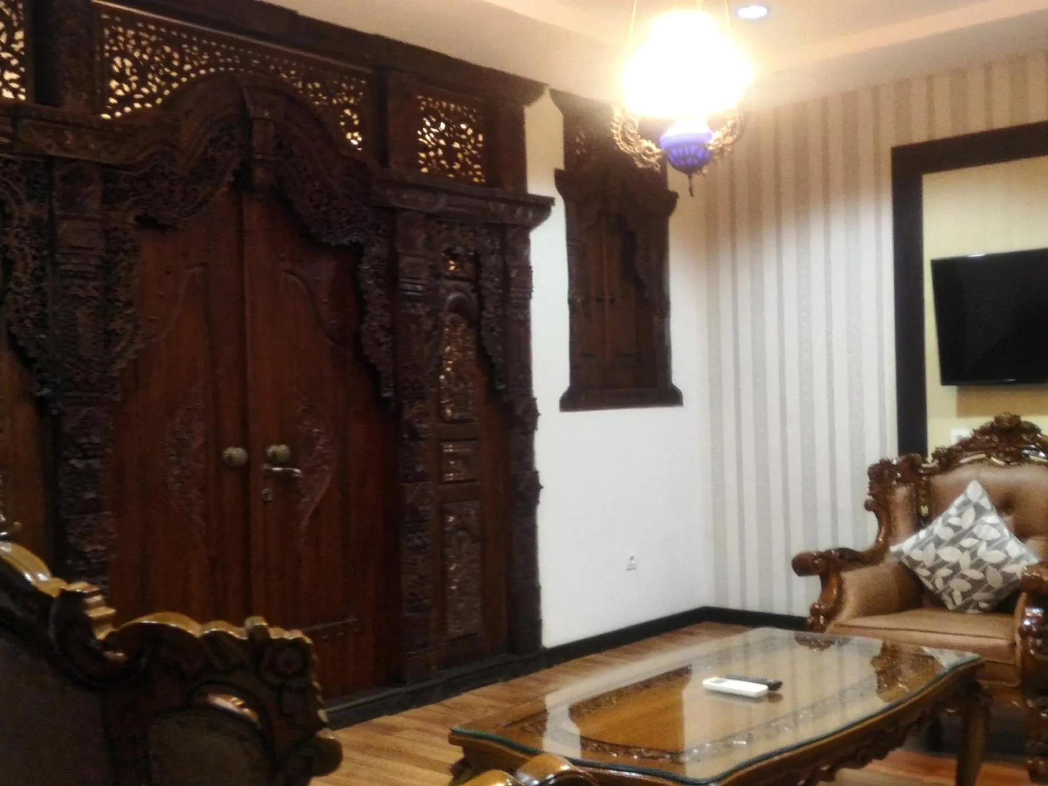 Living room in Grand Puri Saron Hotel Yogyakarta