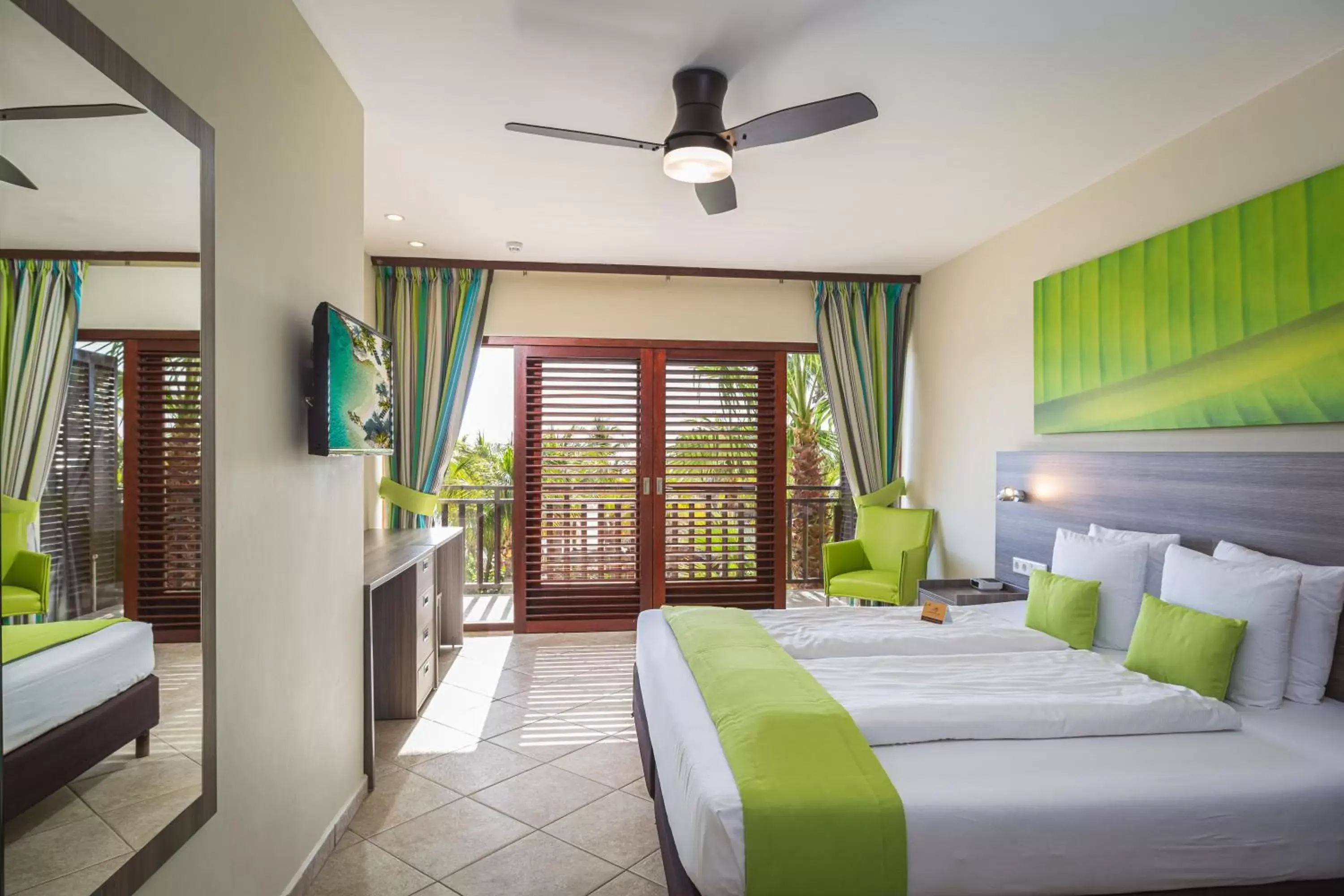 Bedroom in LionsDive Beach Resort