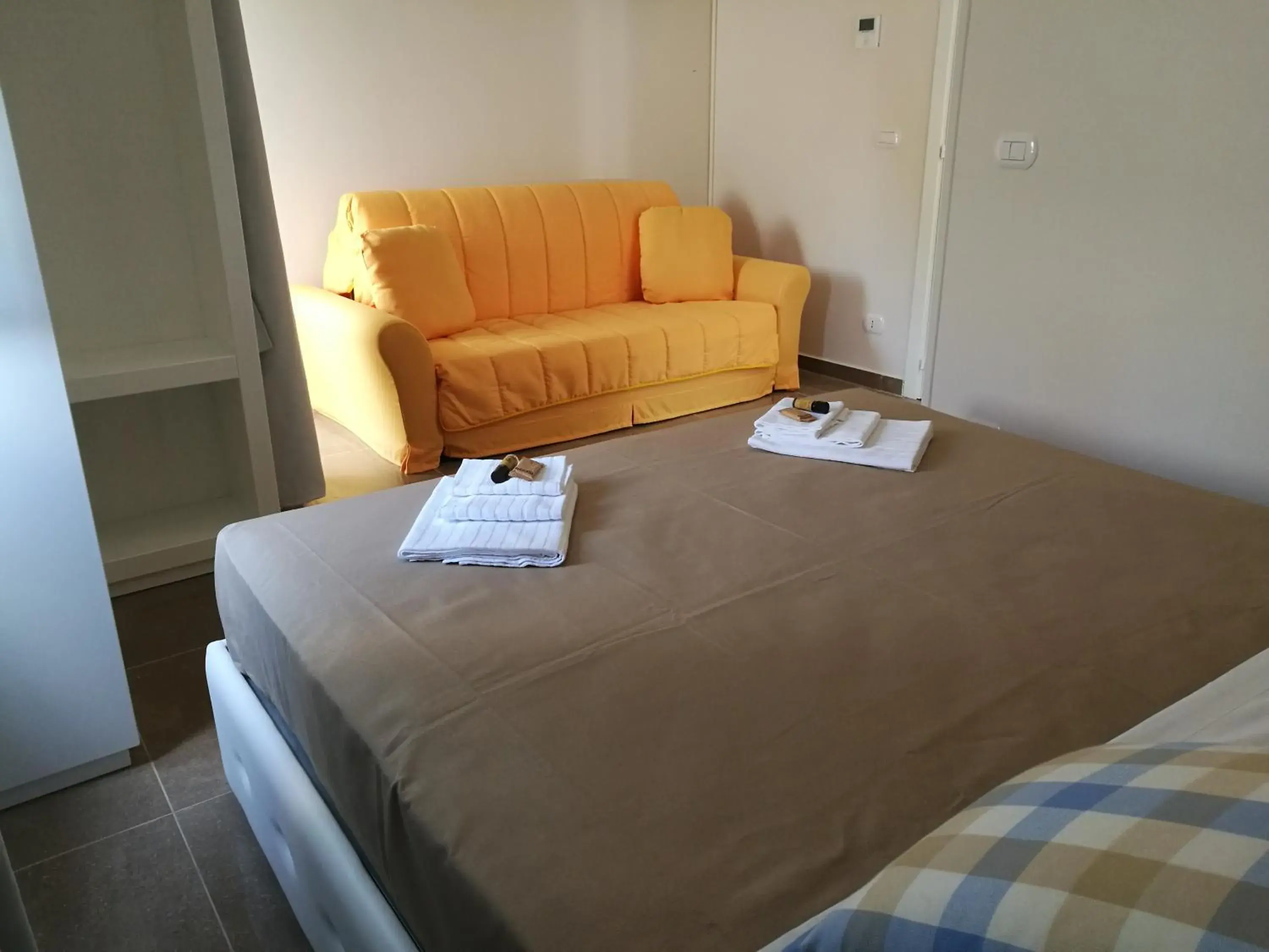 Bedroom, Seating Area in Hotel Residence La Corvetta