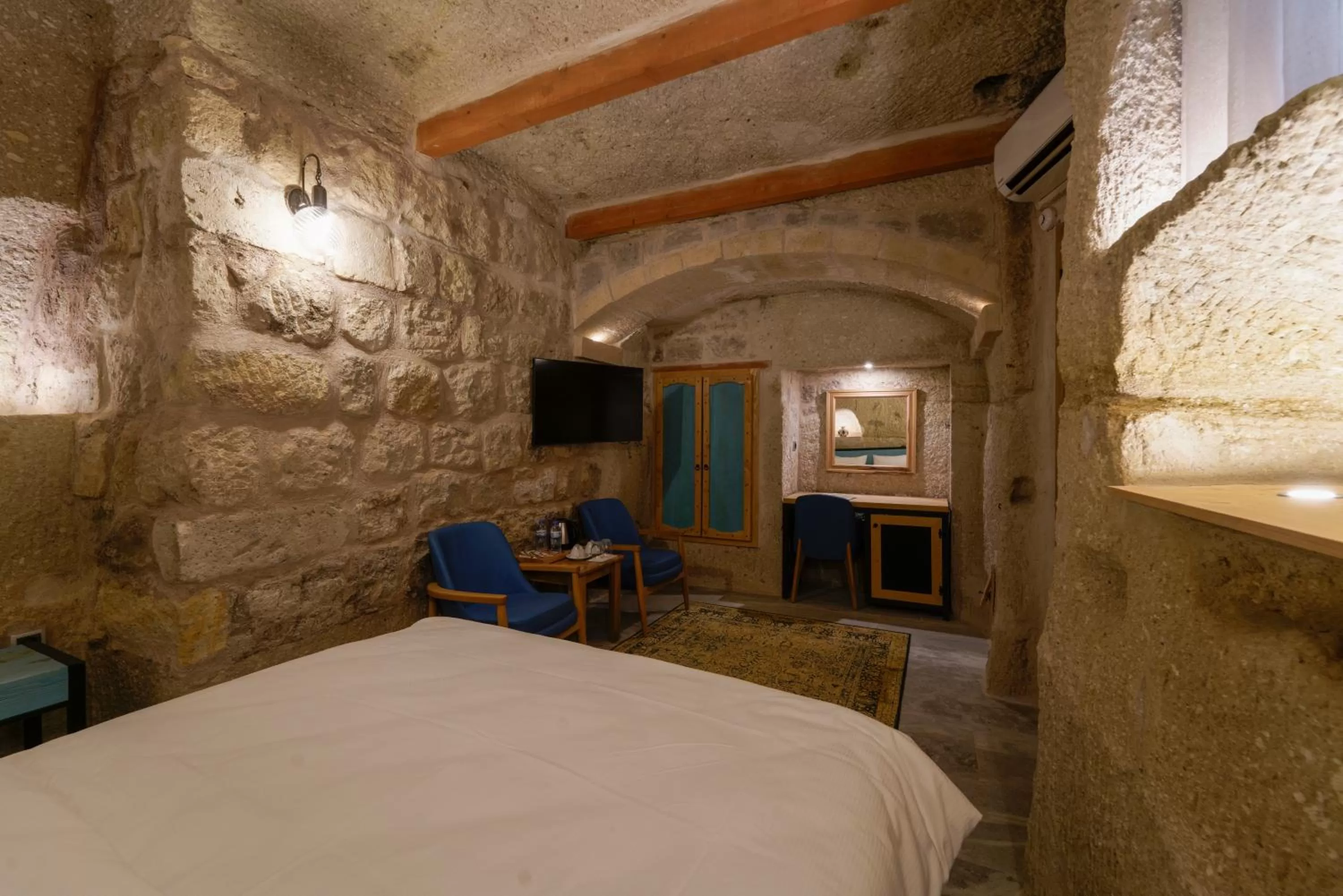 Bed in The Niche Cave Hotel