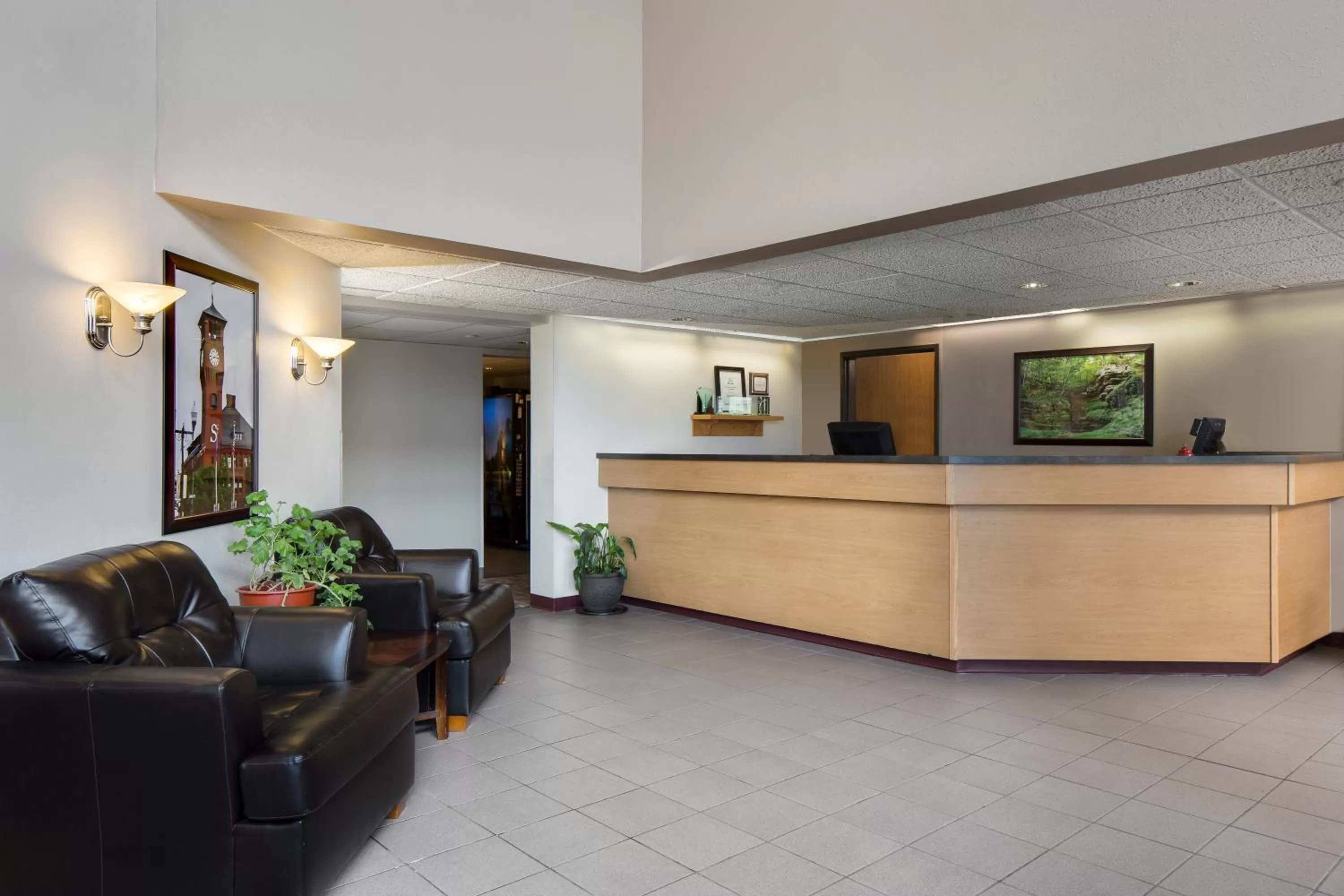 Lobby or reception in Super 8 by Wyndham Menomonie WI