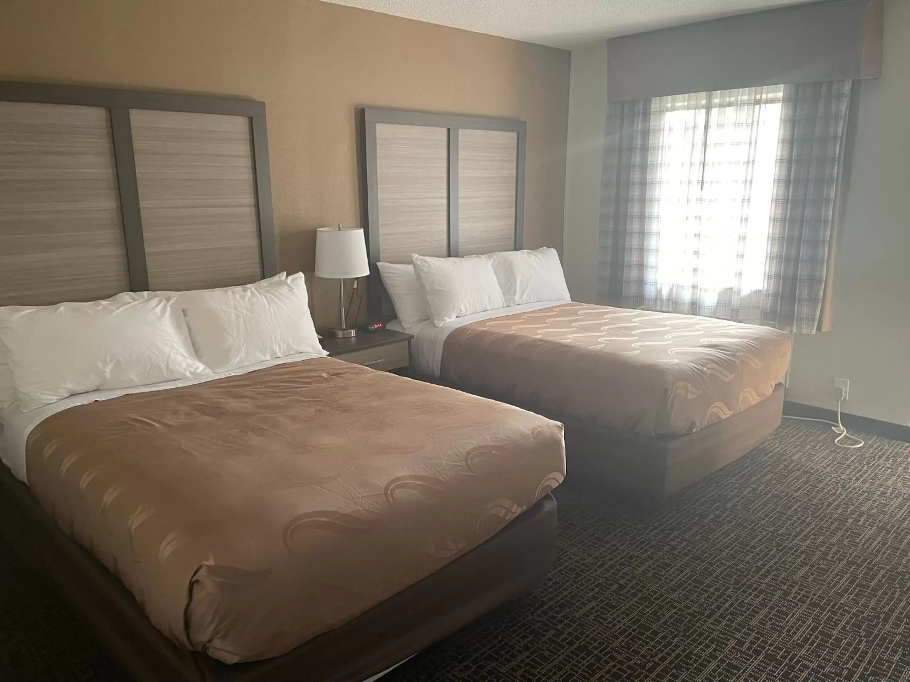 Bedroom, Bed in Quality Inn & Suites Spring Lake - Fayetteville Near Fort Liberty