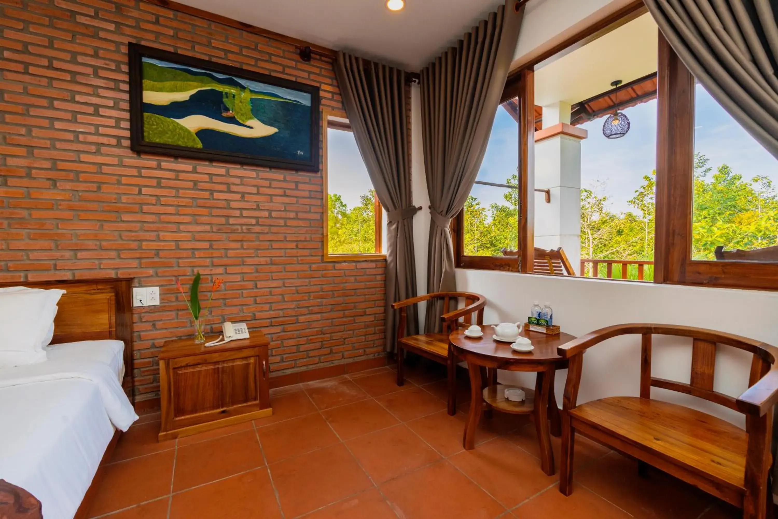 Bedroom, Seating Area in The Garden House Phu Quoc Resort