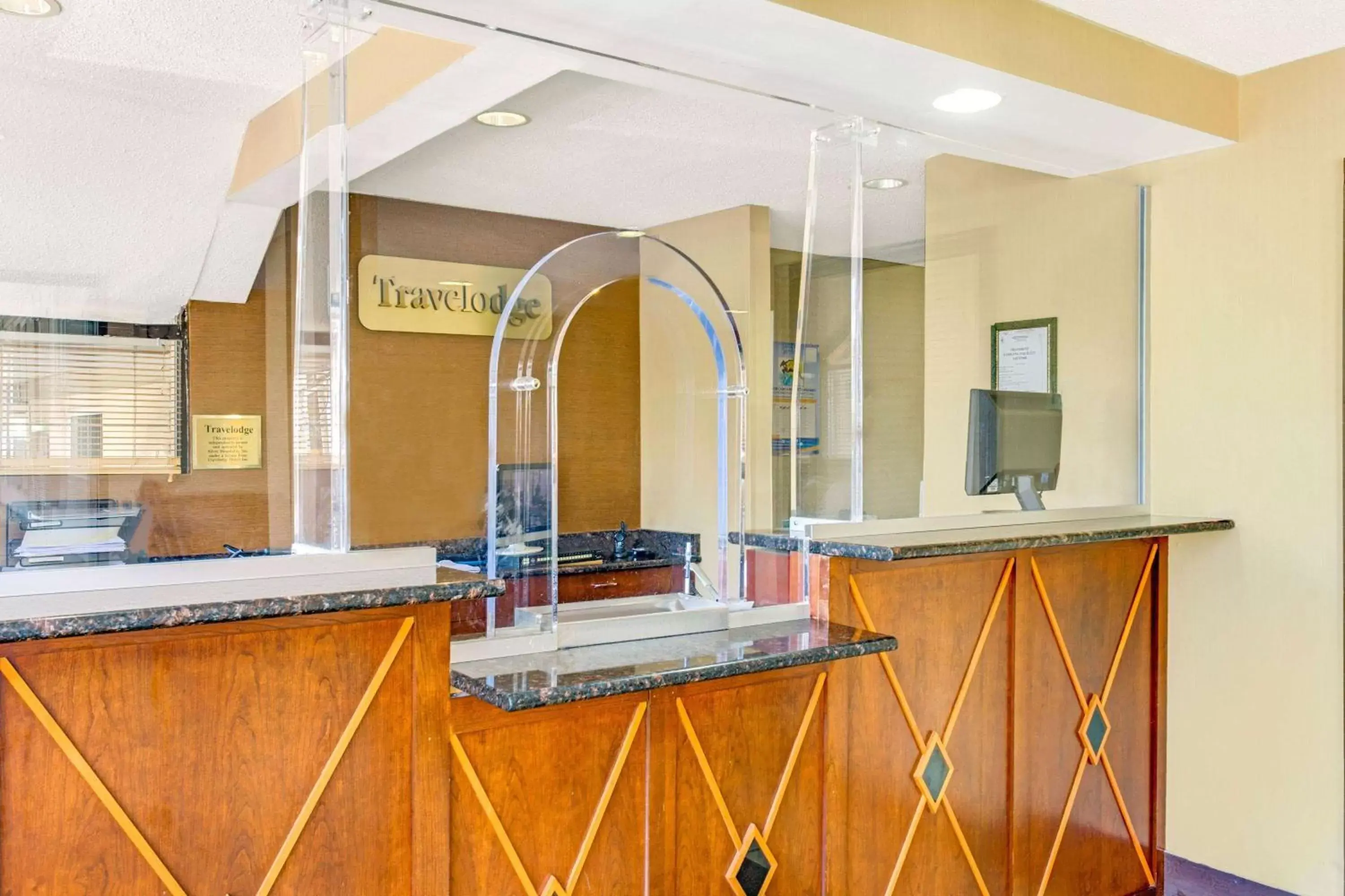 Lobby or reception in Travelodge by Wyndham Silver Spring