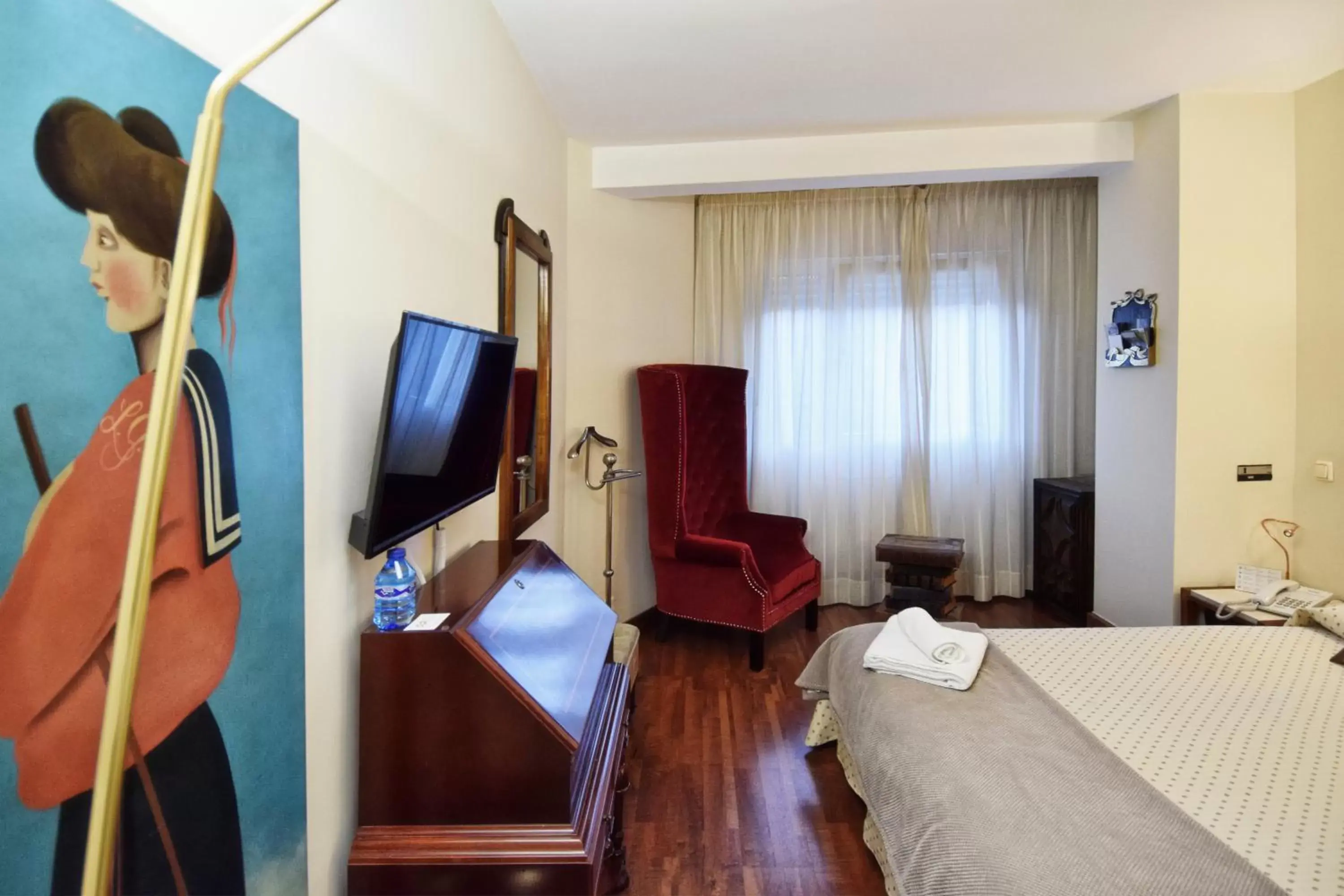 Photo of the whole room, TV/Entertainment Center in Hotel Maria Luisa