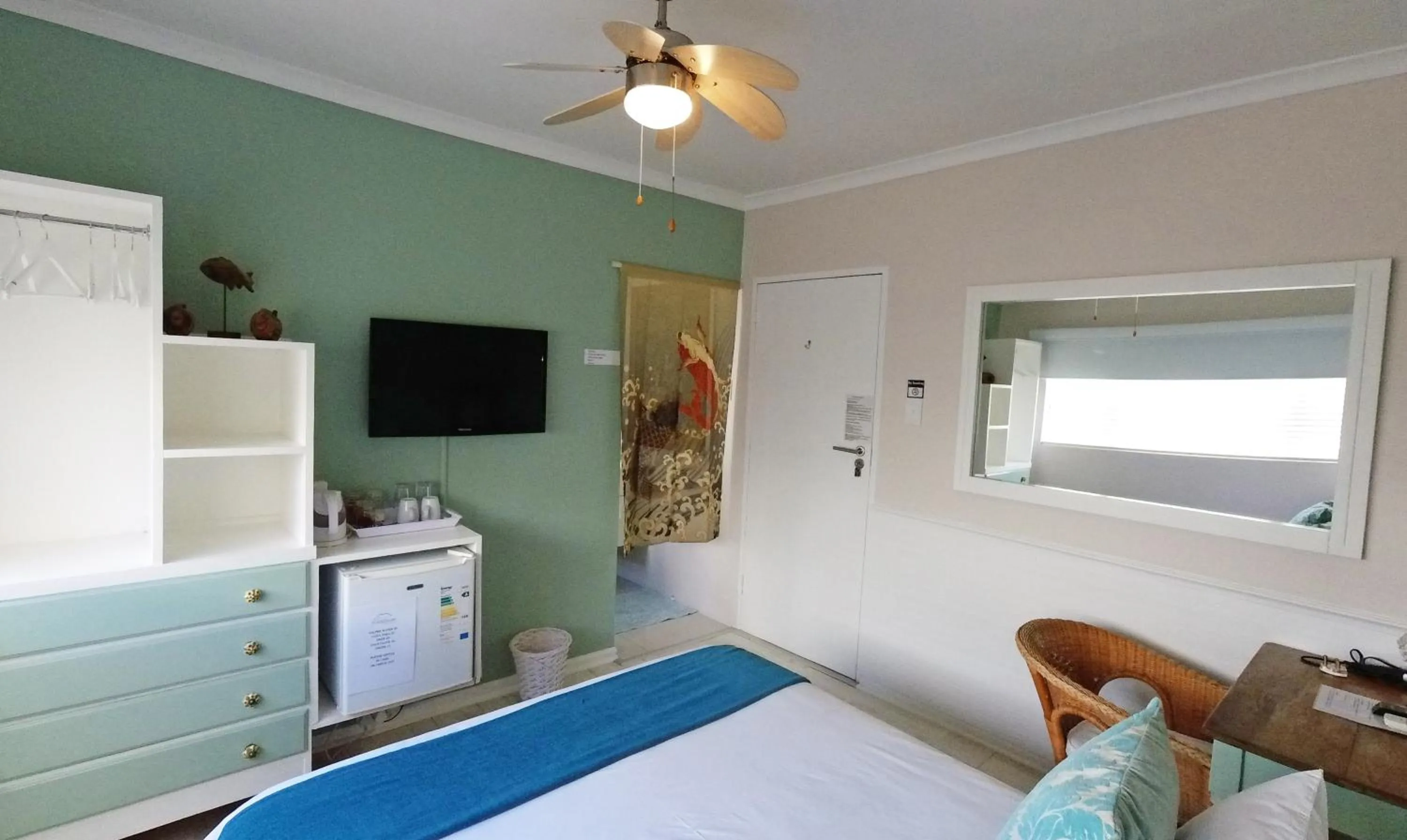 Bed in Dolphin Inn Guesthouse