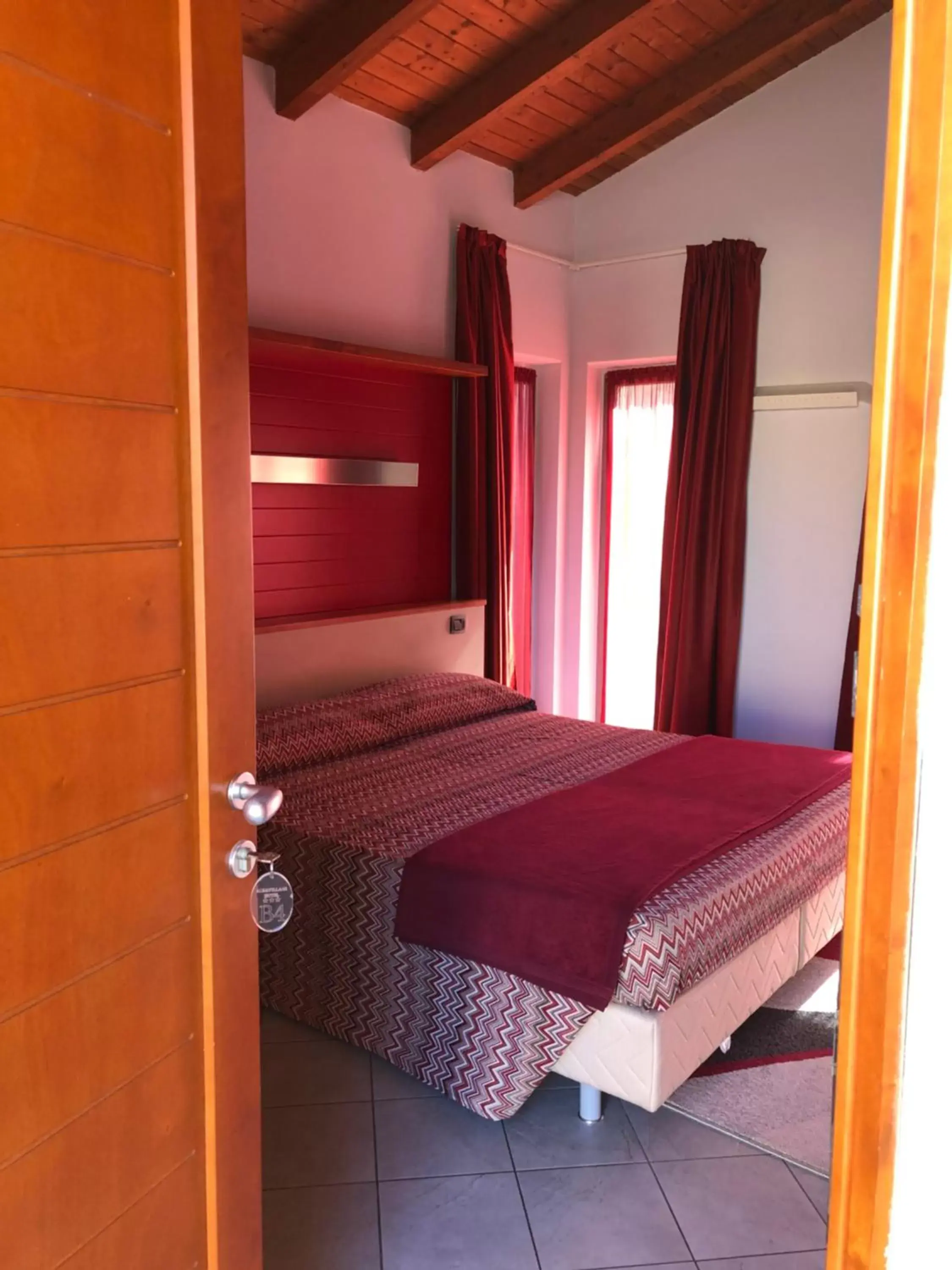 Bed in AgriCamping AlbaVillage Hotel & Wellness