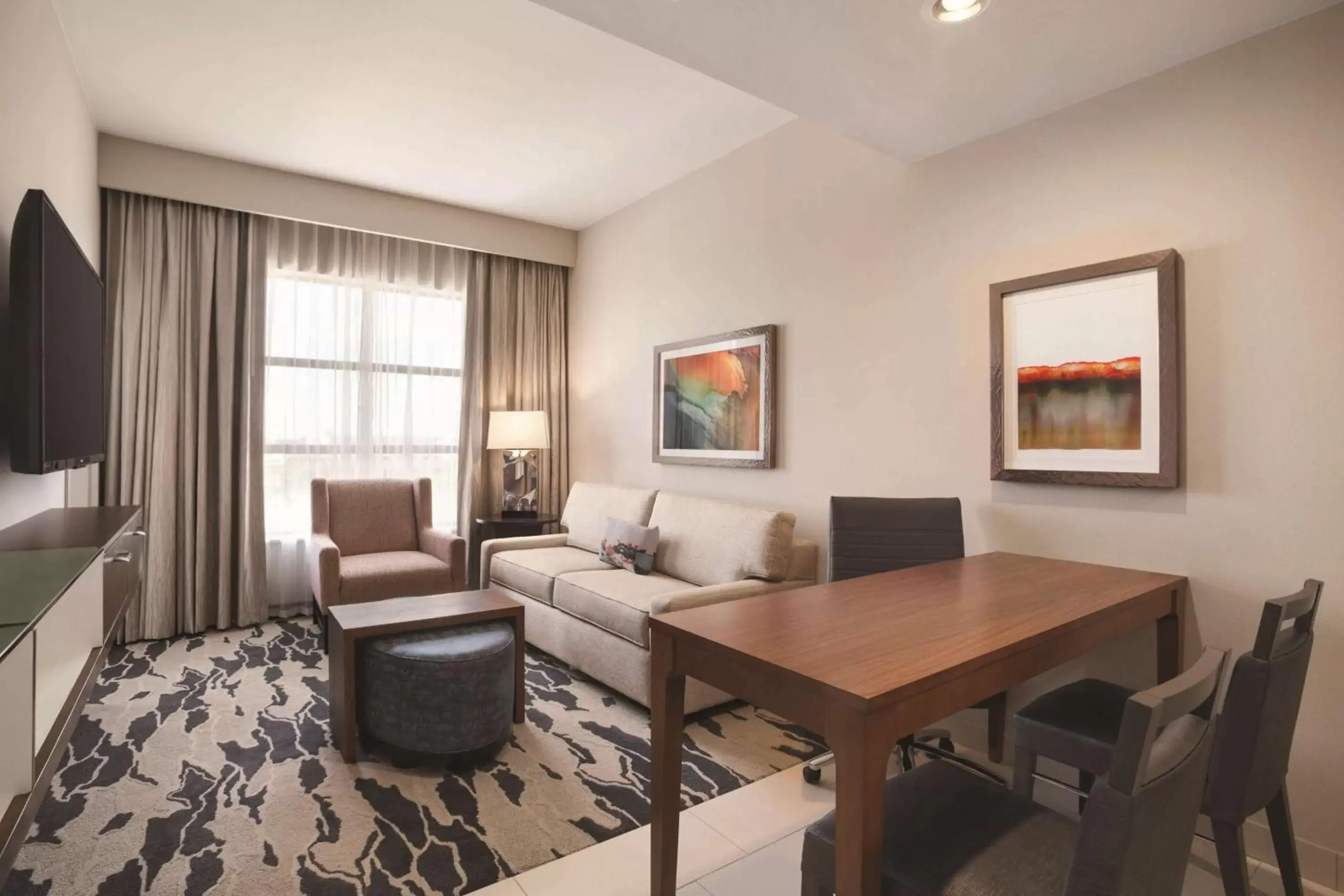 Bed, Seating Area in Embassy Suites by Hilton McAllen Convention Center