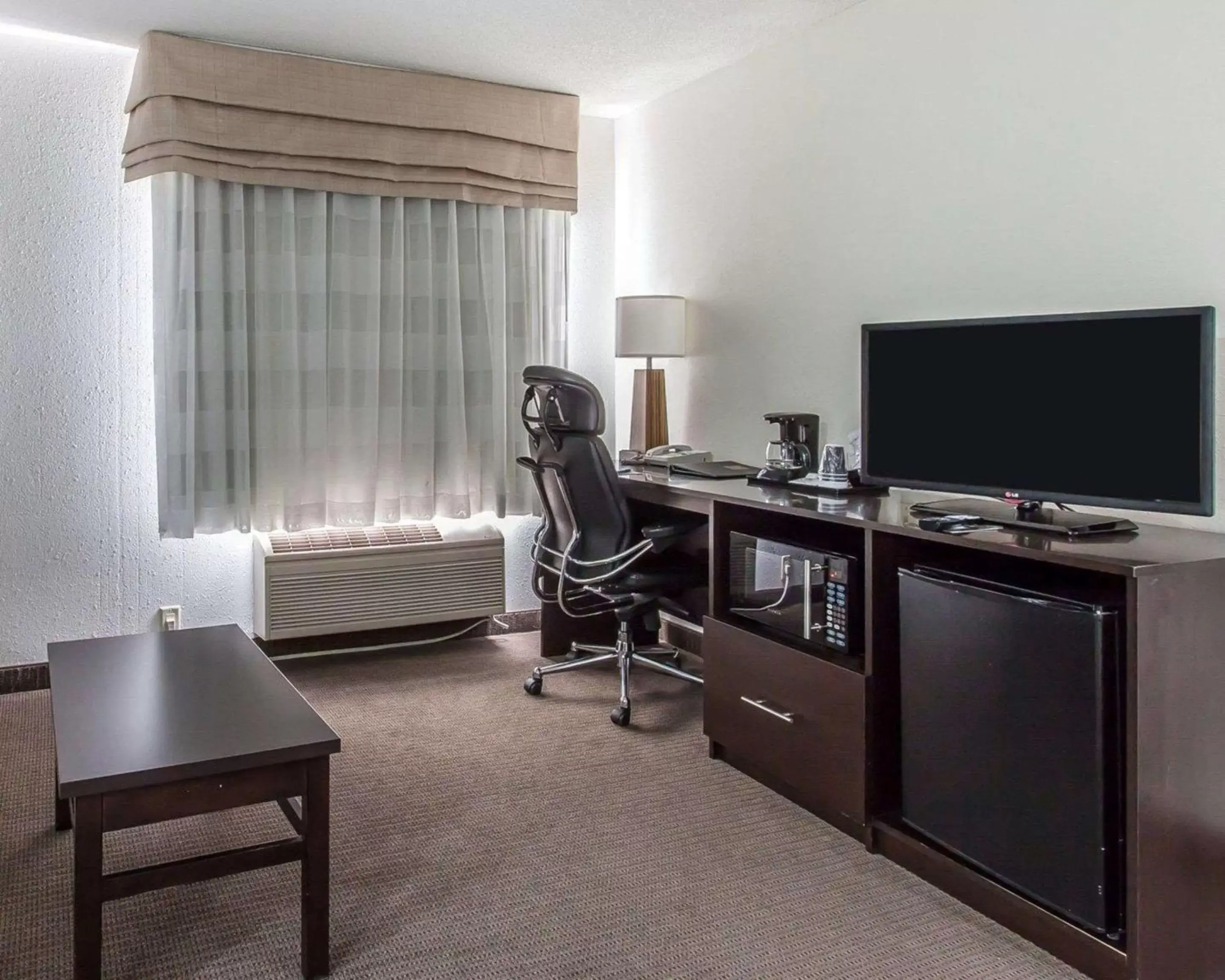 Photo of the whole room, TV/Entertainment Center in Sleep Inn & Suites Near I-90 and Ashtabula