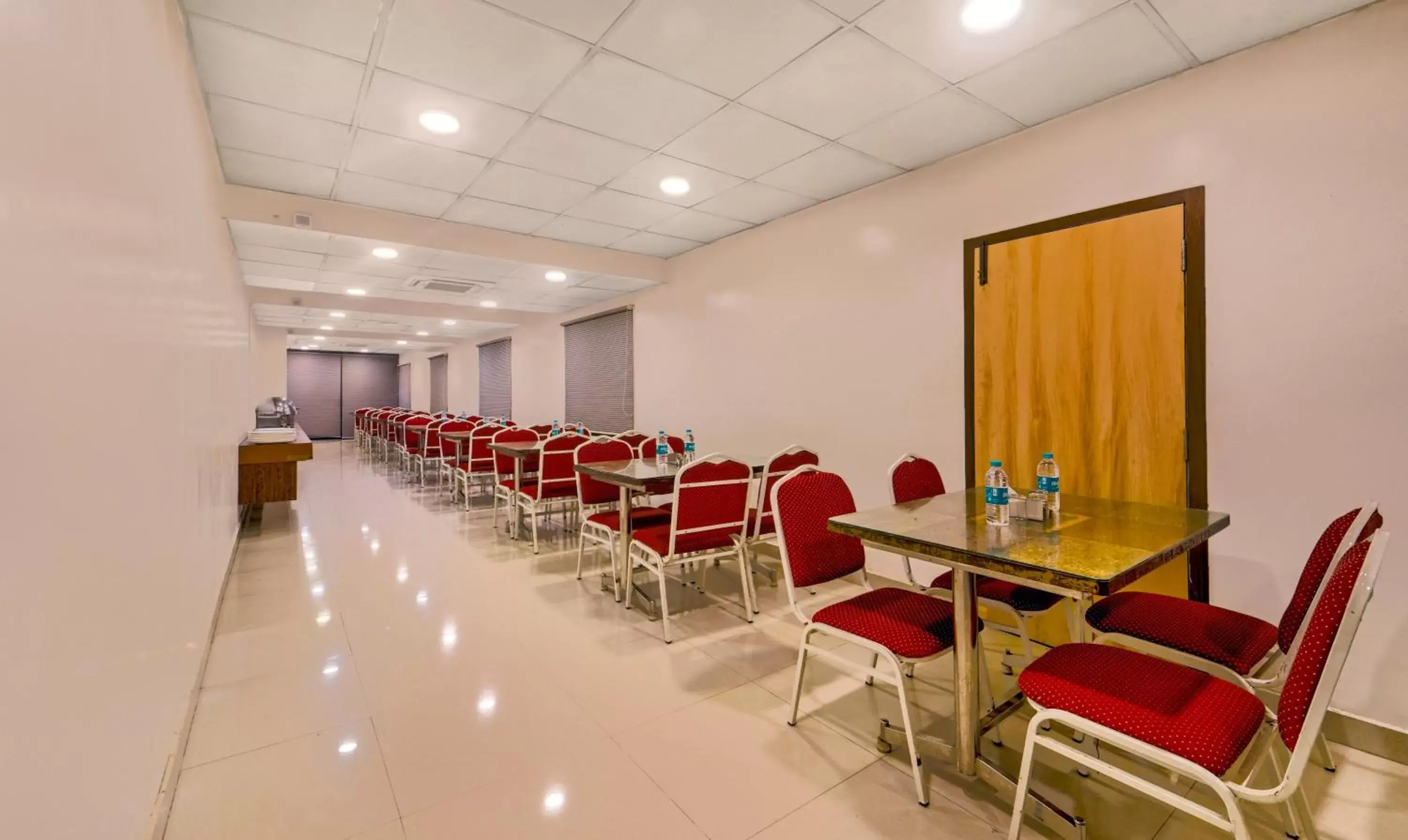 Dining area in FabHotel Golden Swan Chennai Airport Free Pickup & Drop