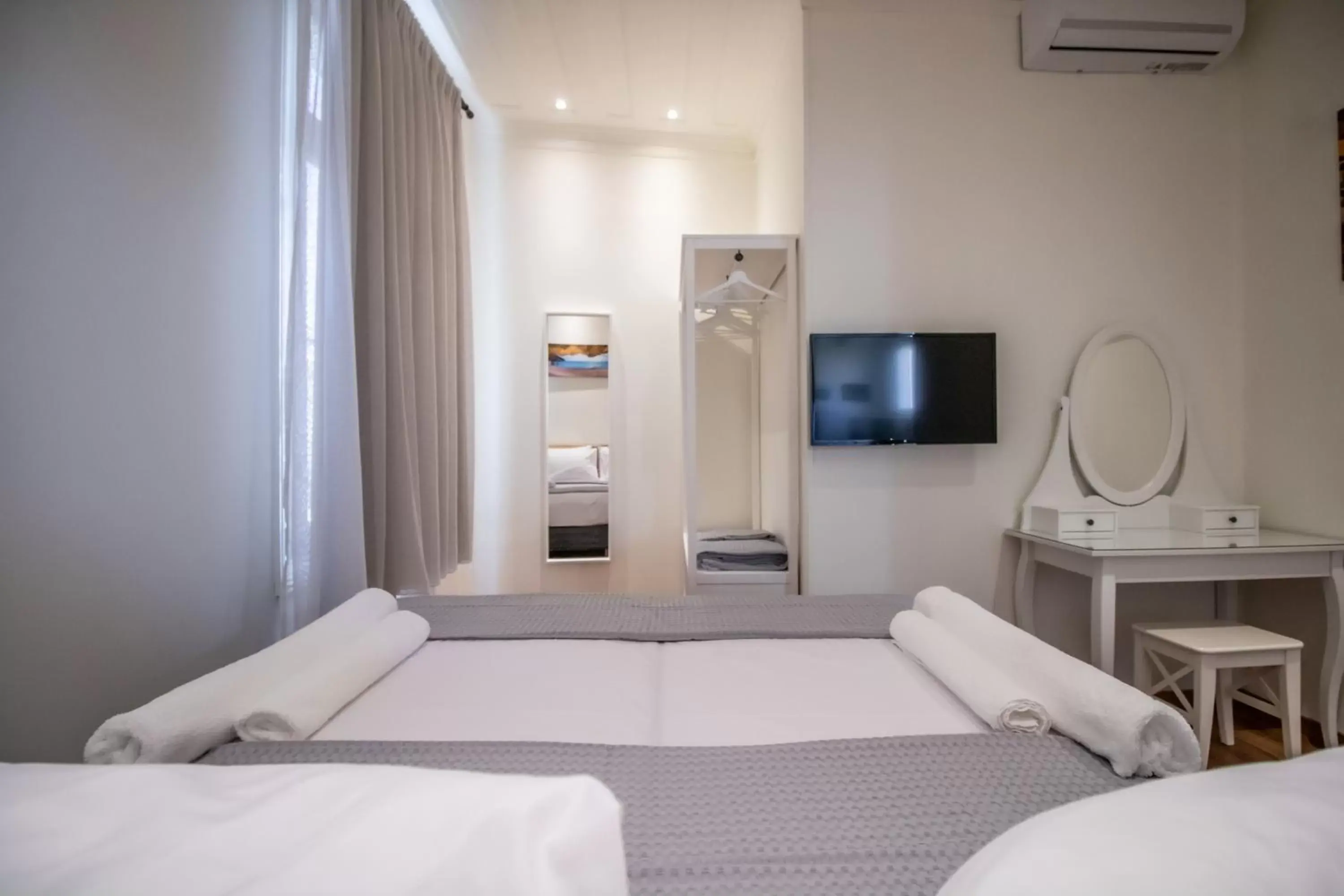 Bed in Levkosh Apartments at Lefkada's Heart