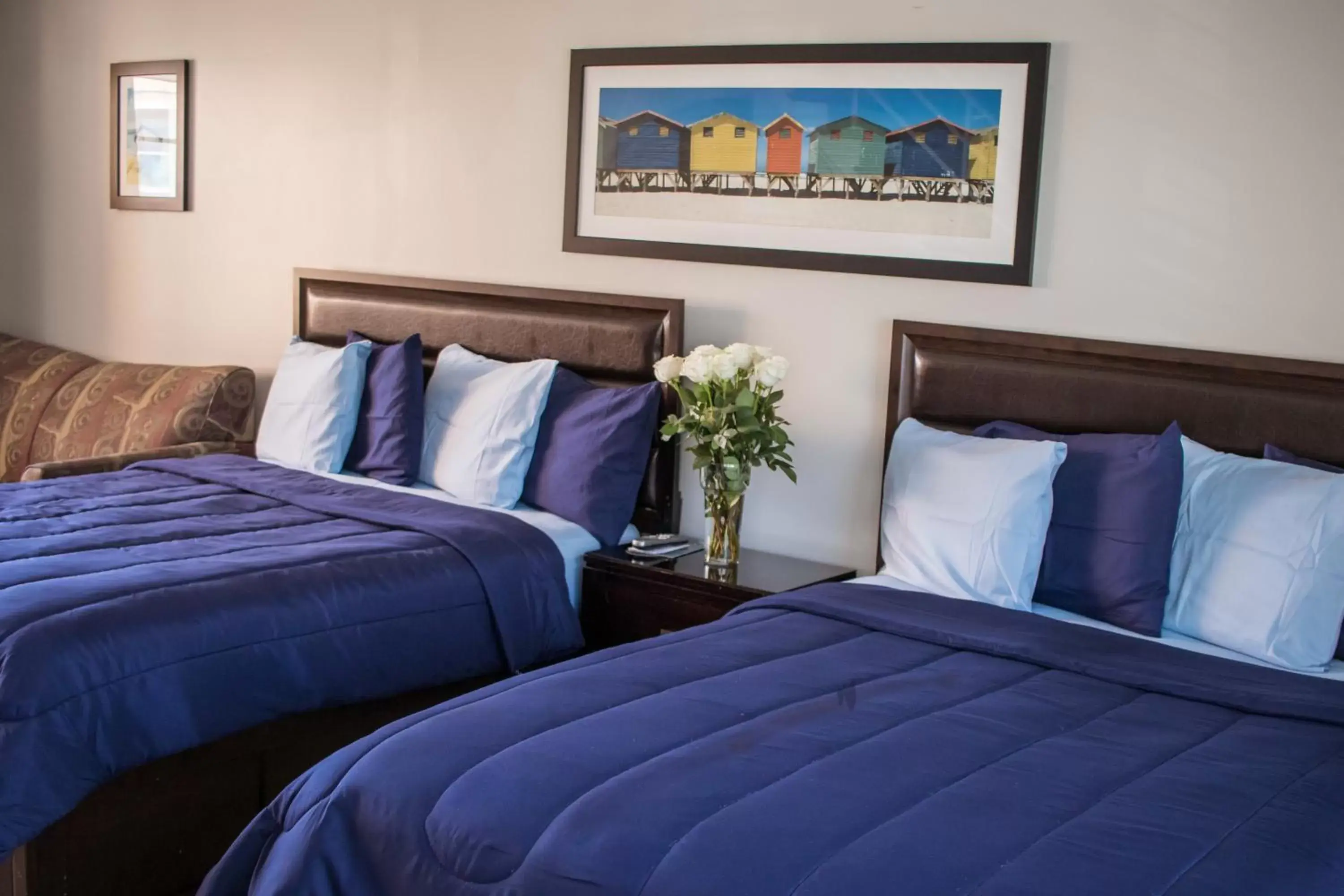 Bed in Riptide Oceanfront Hotel
