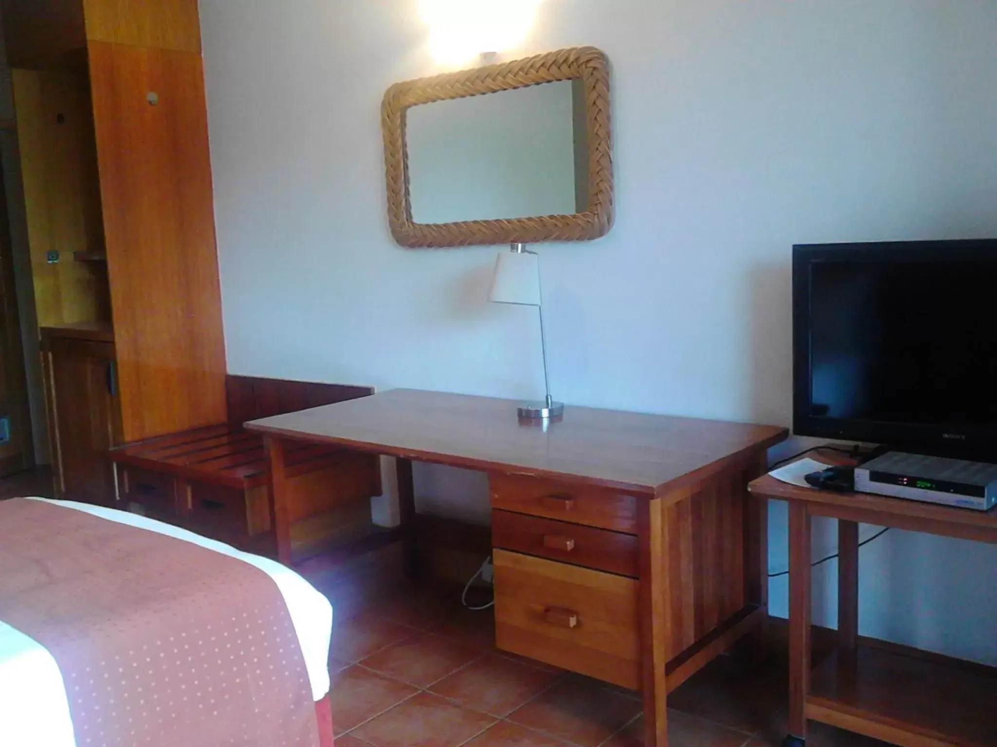 Photo of the whole room, TV/Entertainment Center in Holiday Inn & Suites Port Moresby, an IHG Hotel