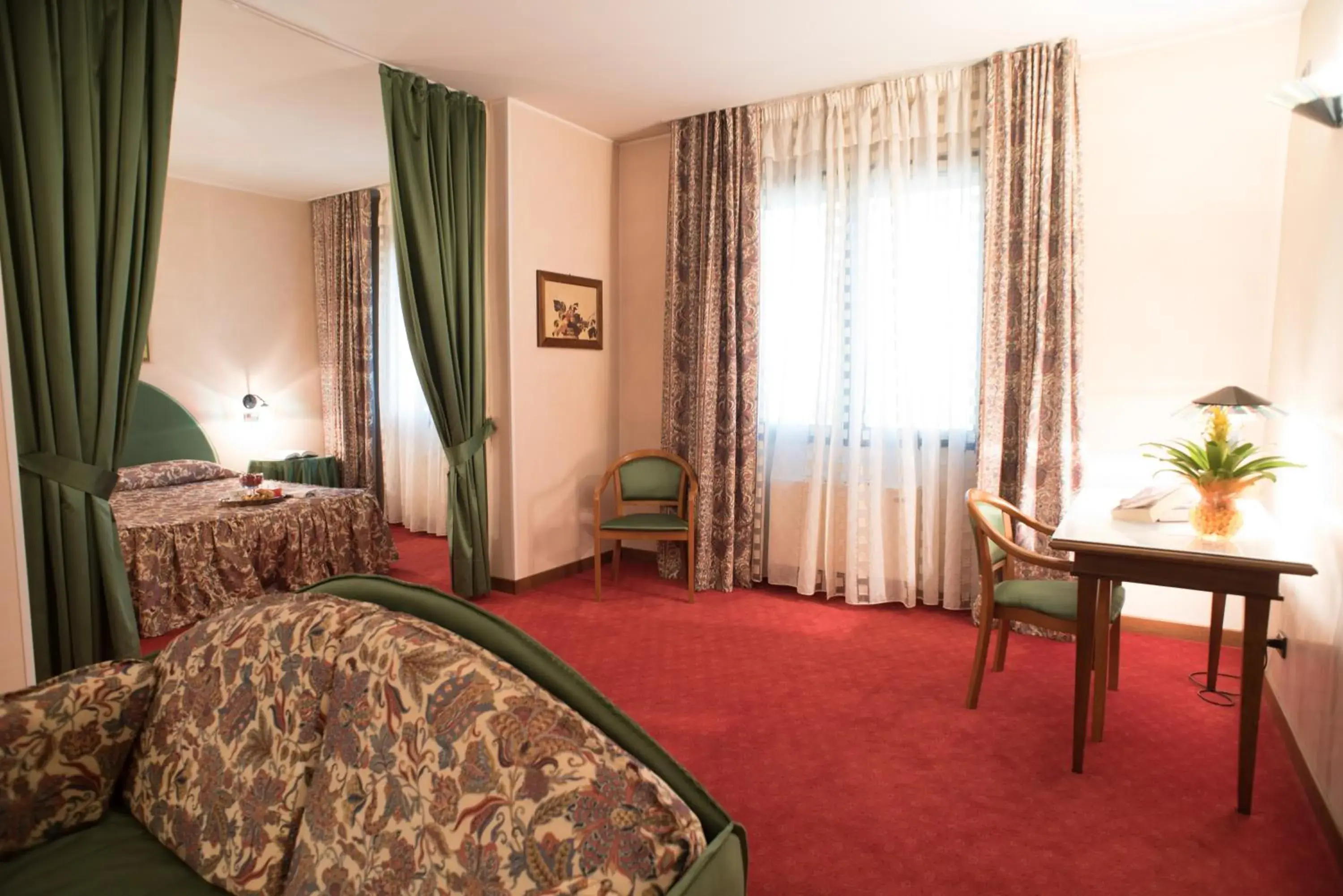 Photo of the whole room, Seating Area in Hotel Tessarin