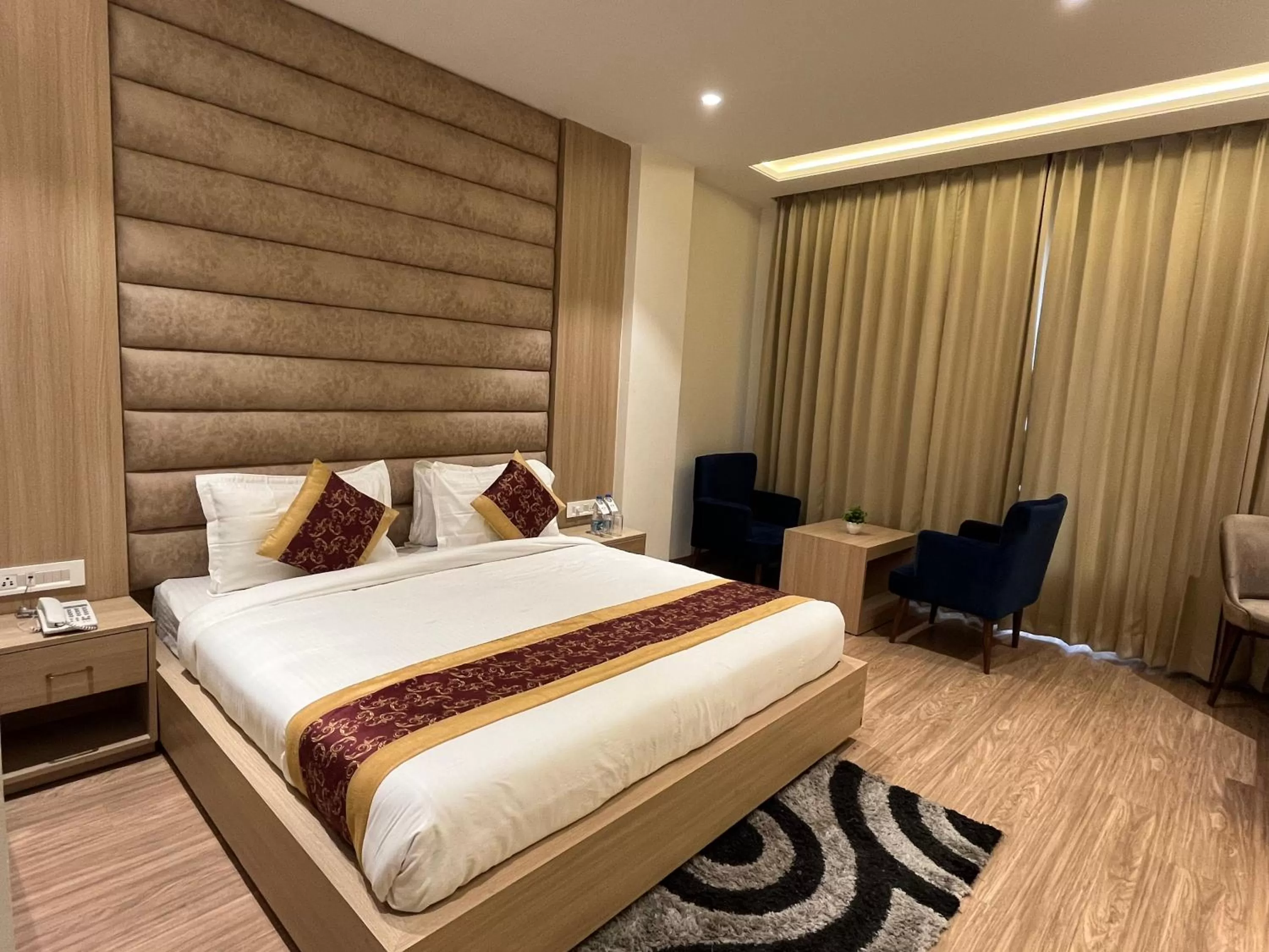 Photo of the whole room, Bed in RRV Hotel