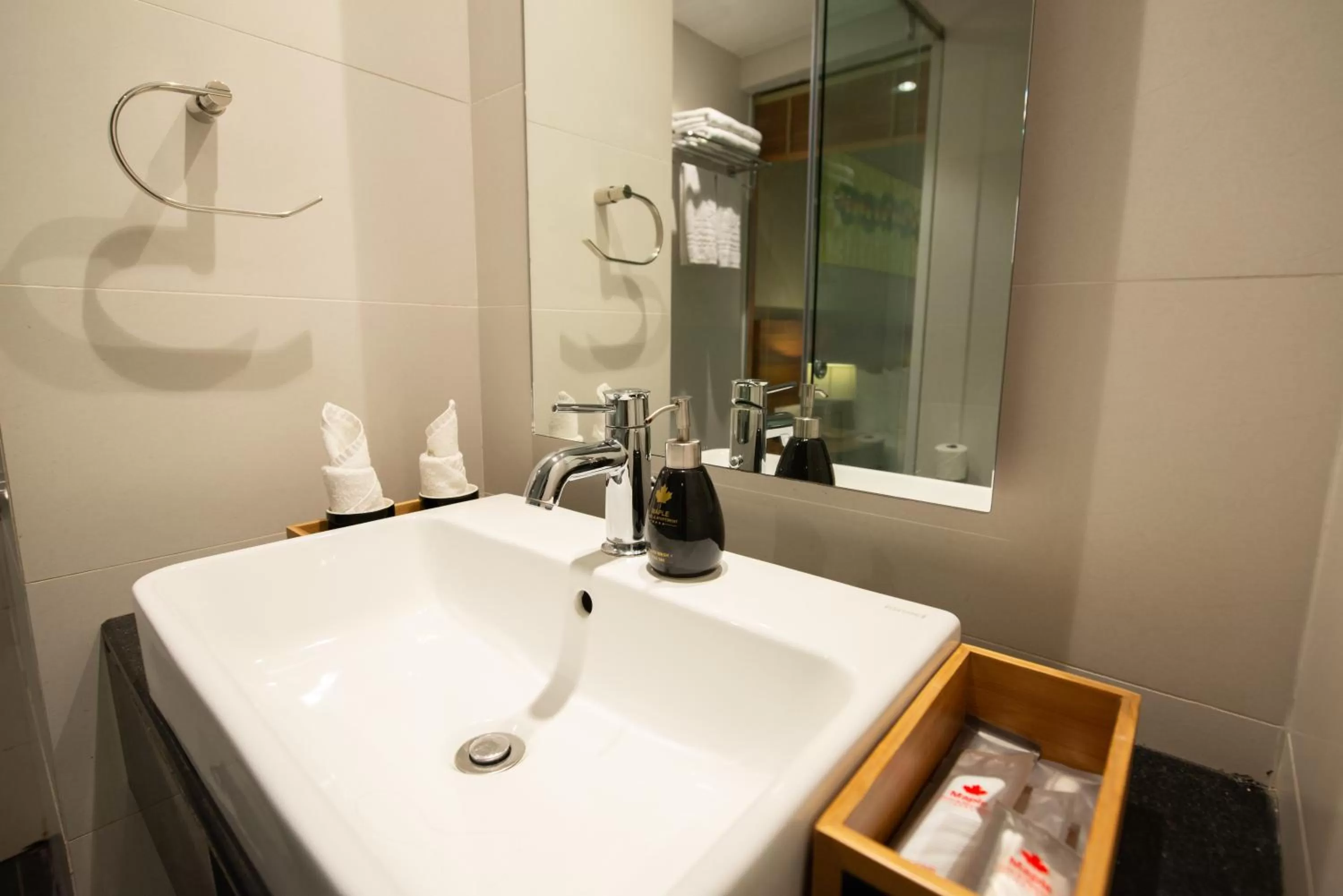 Shower in Maple Hotel & Apartment