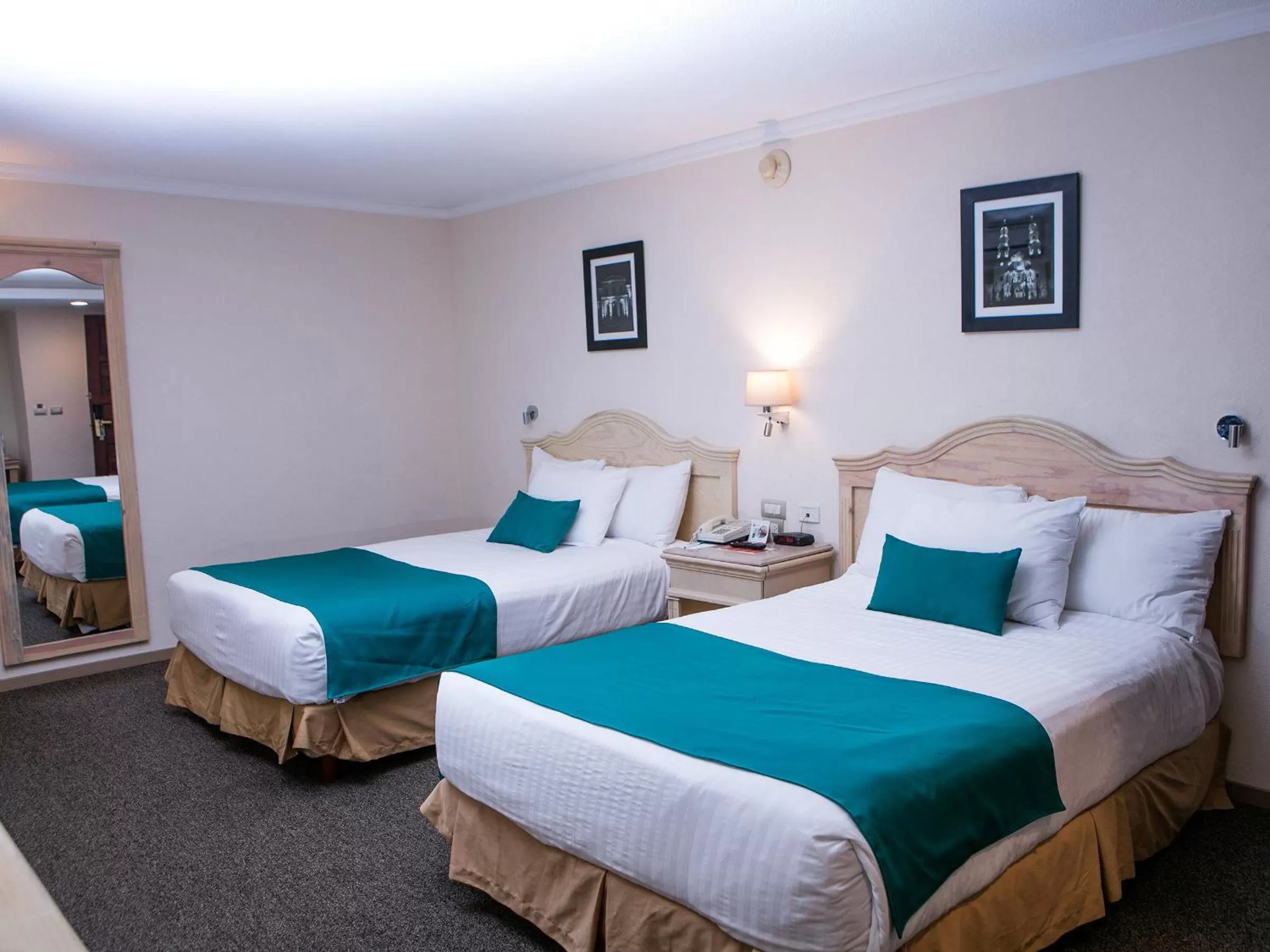 Photo of the whole room, Bed in Quality Inn Aguascalientes