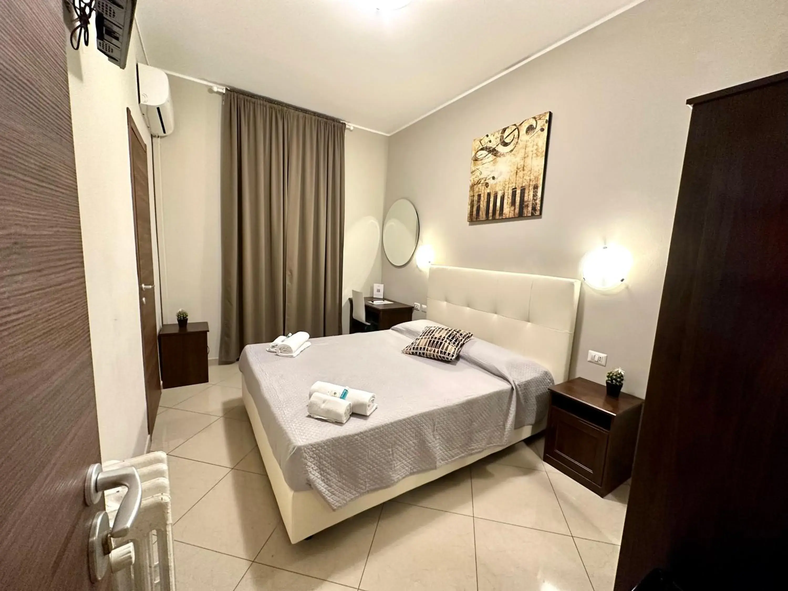 Bedroom in Golden Milano Hotel