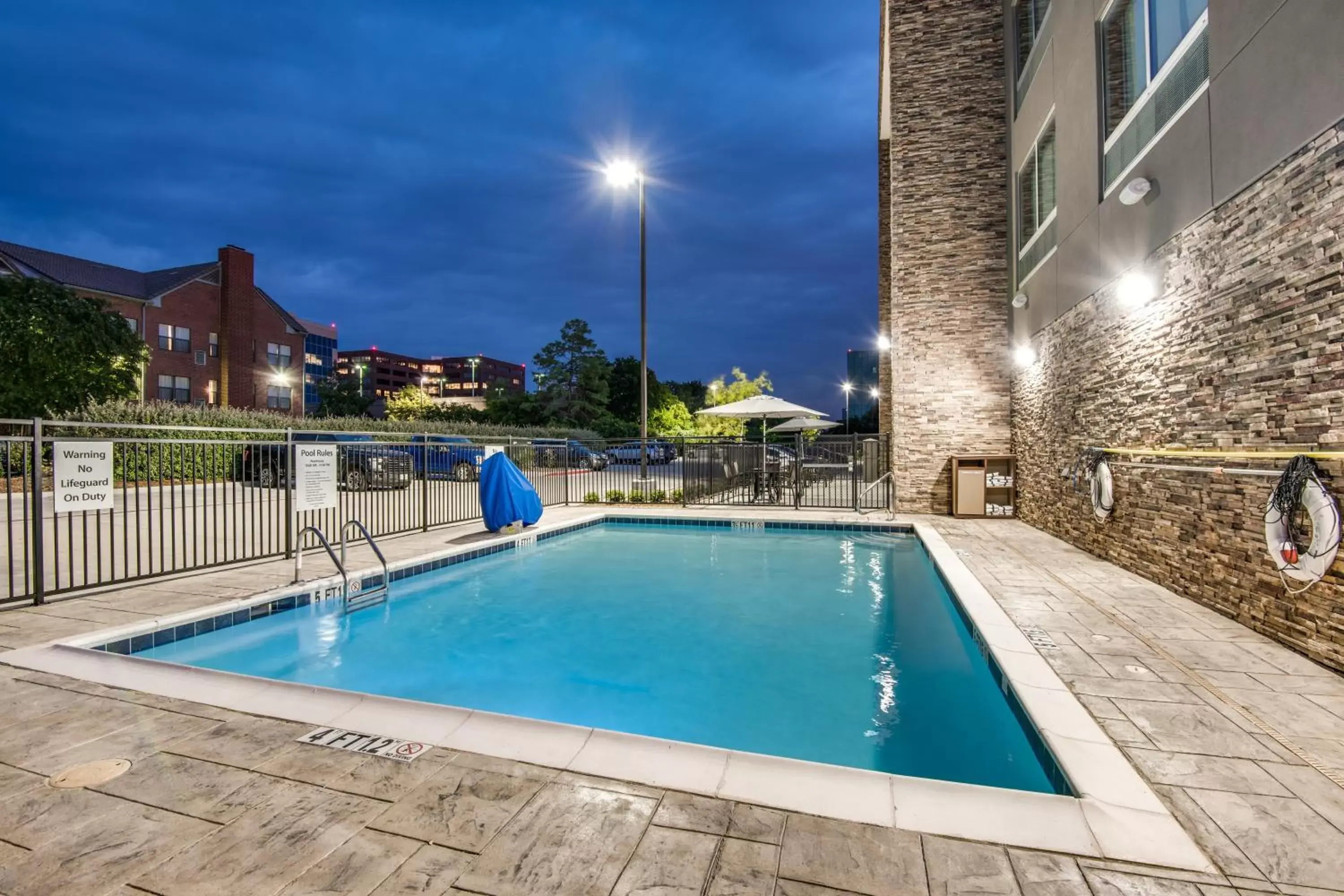 Swimming Pool in Holiday Inn Express & Suites Dallas North - Addison, an IHG Hotel