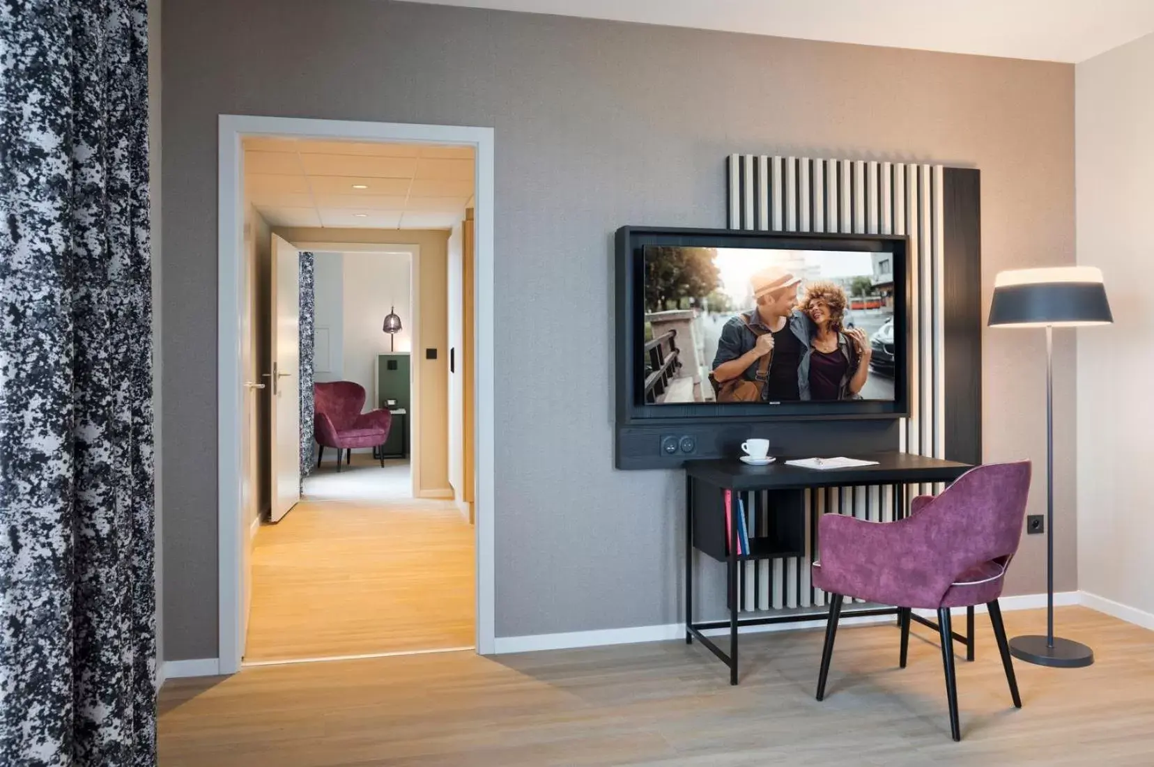 Photo of the whole room, TV/Entertainment Center in Citadines Eurometropole Strasbourg