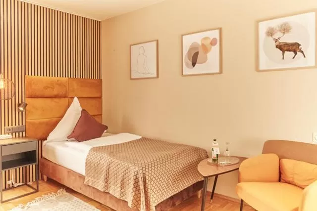 Photo of the whole room, Bed in Hotel van Bebber