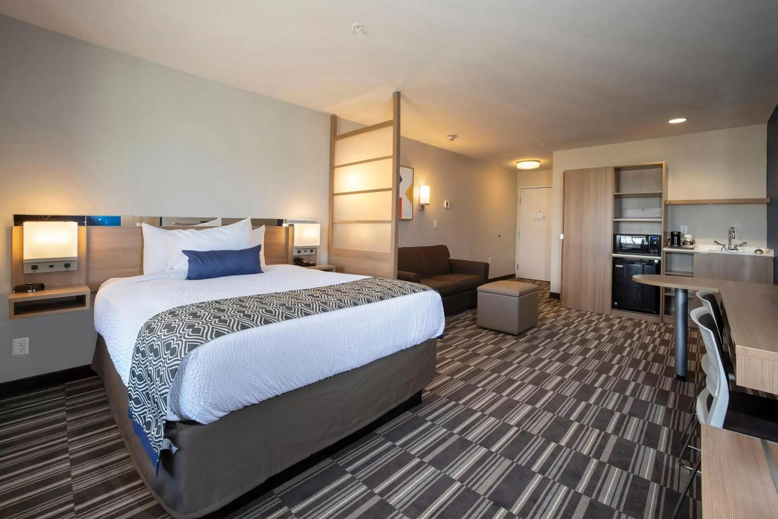 Bed in Microtel Inn & Suites by Wyndham Loveland