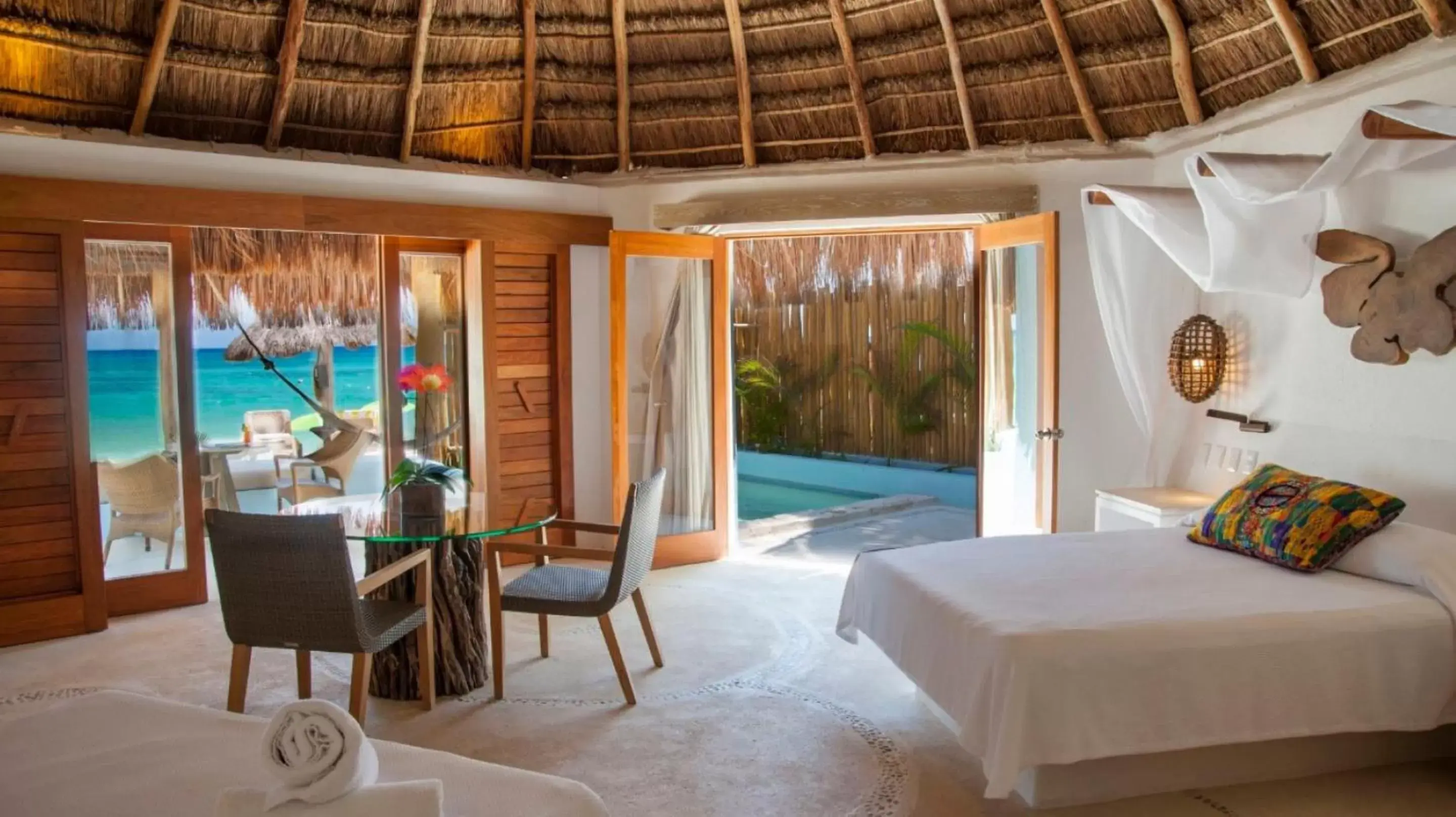 Bedroom, Swimming Pool in Mahekal Beach Front Resort & Spa